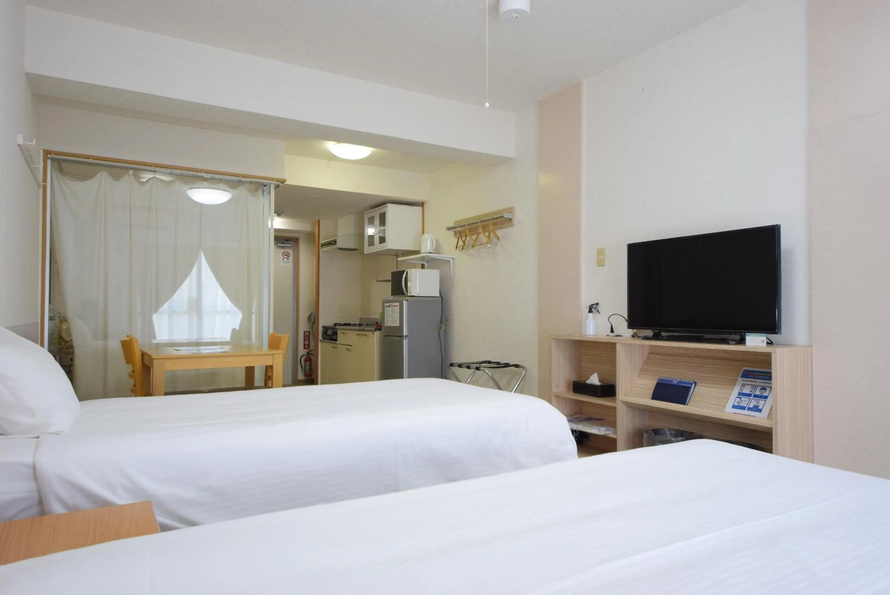 Photo of the whole room, TV/Entertainment Center in STAY IN SUMUKA Kokusai Street