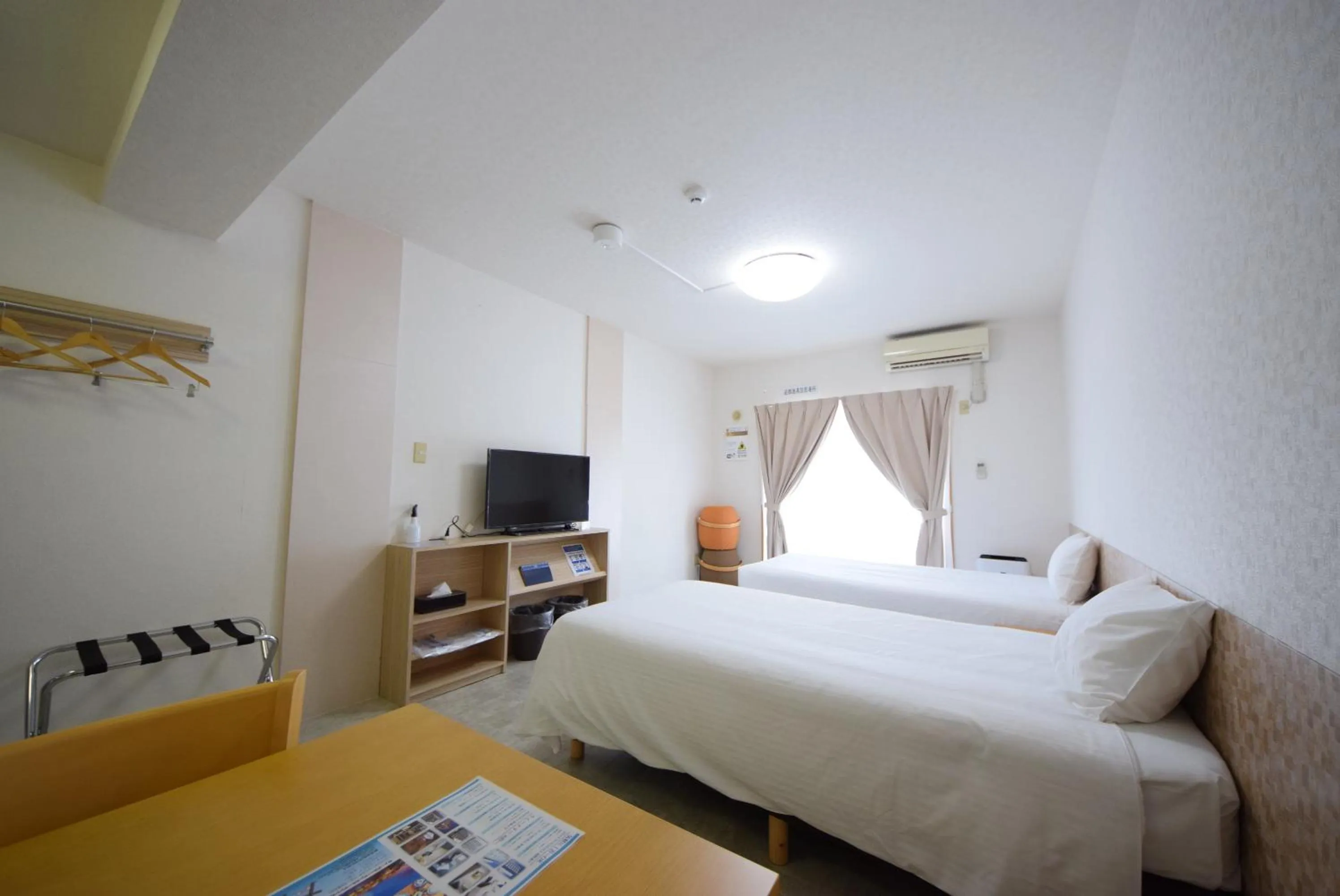 Bed in STAY IN SUMUKA Kokusai Street