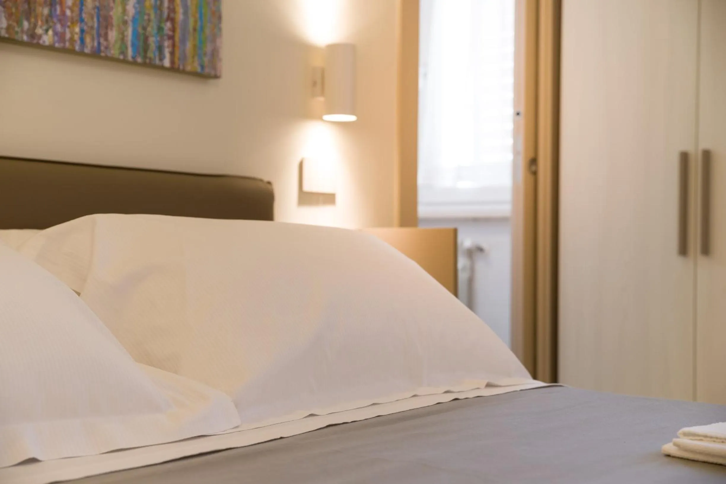 Bed in kamilia guestrooms