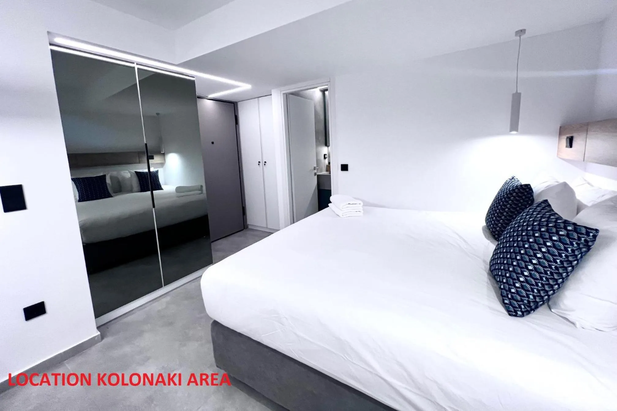 Bed in PINACOTA SUITES ATHENS