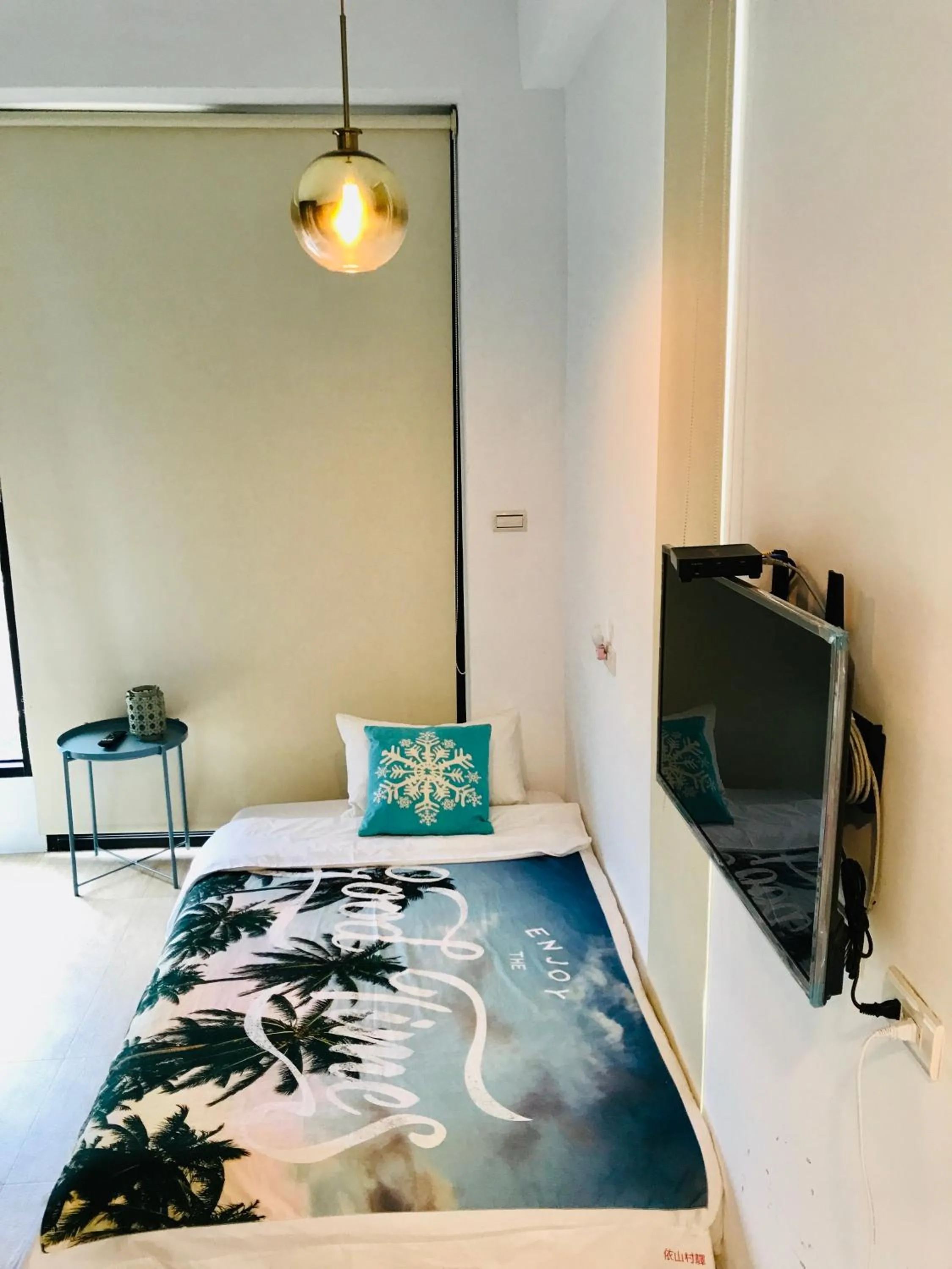 Bed in 依山村驛Yishan Village