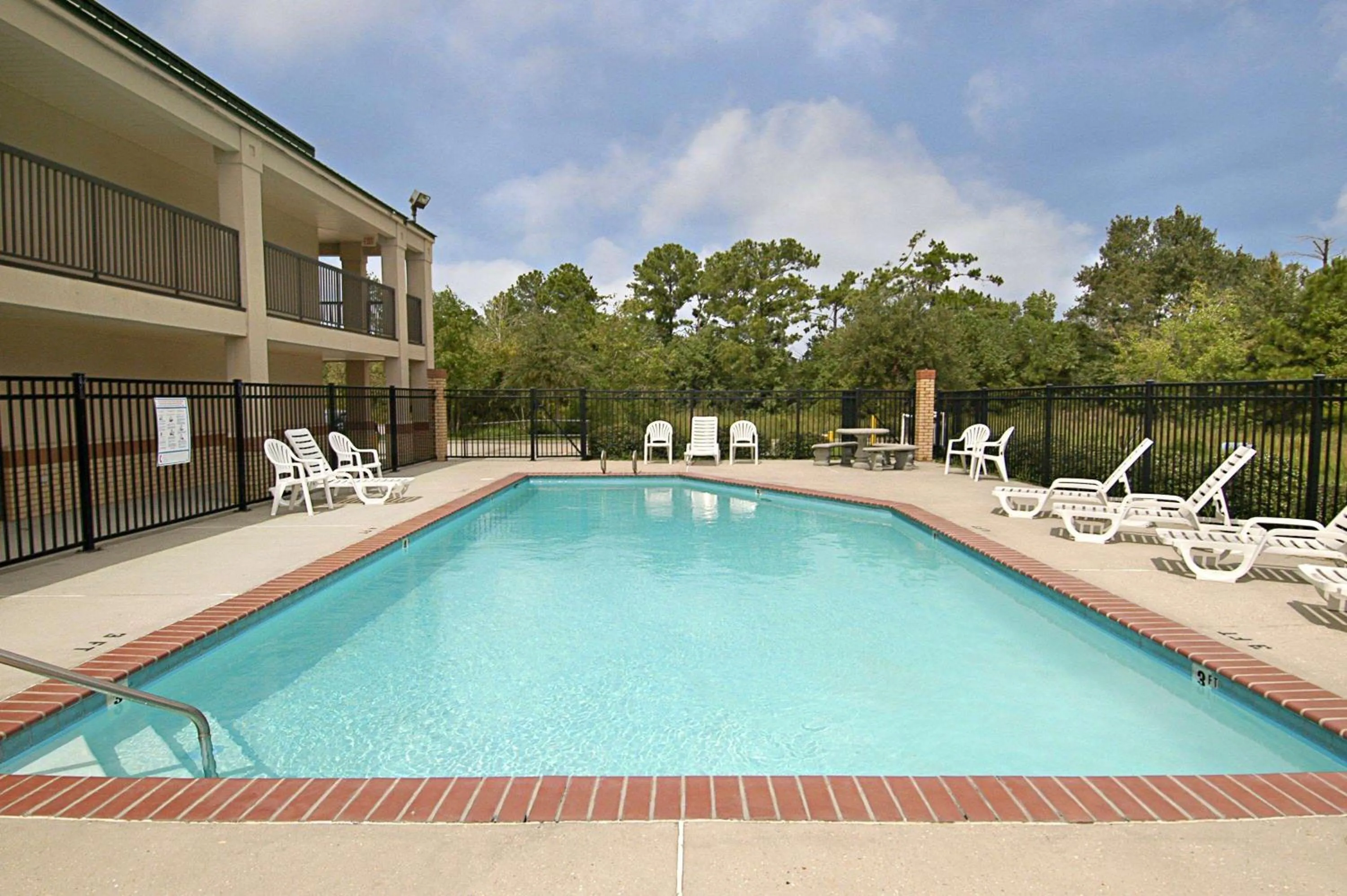 Pool view in Super 8 by Wyndham Slidell