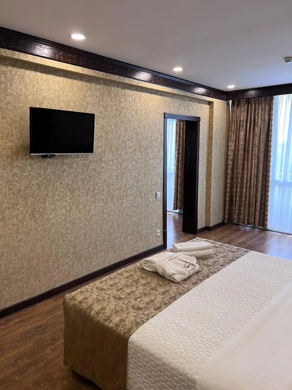 Communal lounge/ TV room, Bed in Orient Star Varahsha