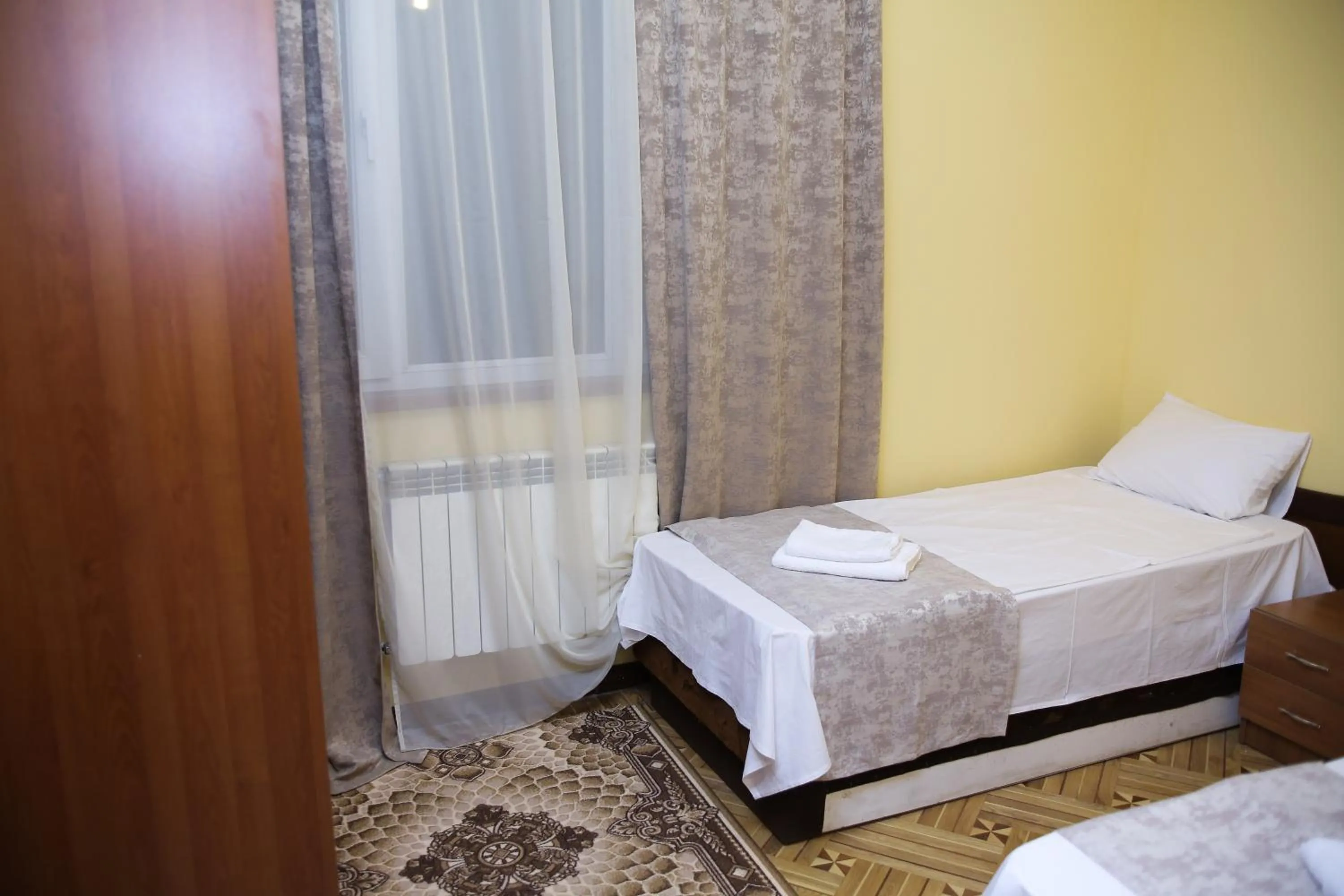 Bed in Red Hotel Yerevan Center