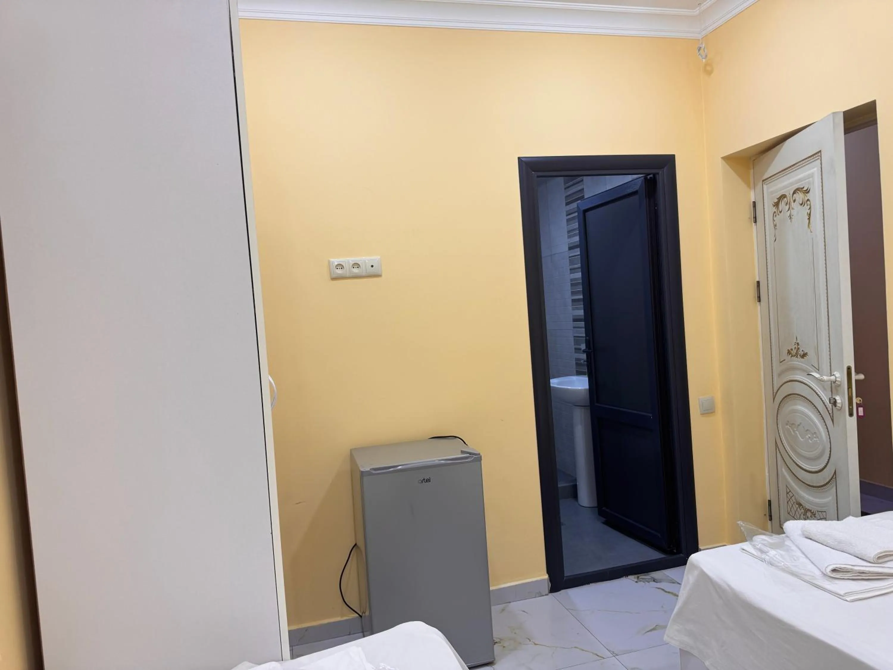 wardrobe, Bed in Red Hotel Yerevan Center