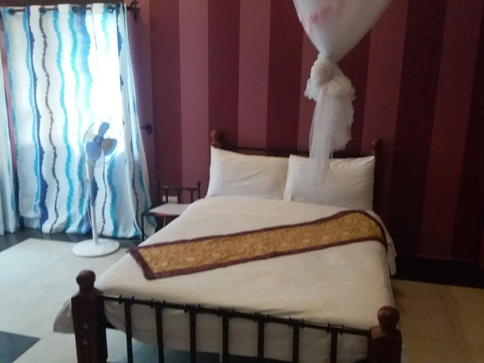 Bed in Egret Pilgrims Inn