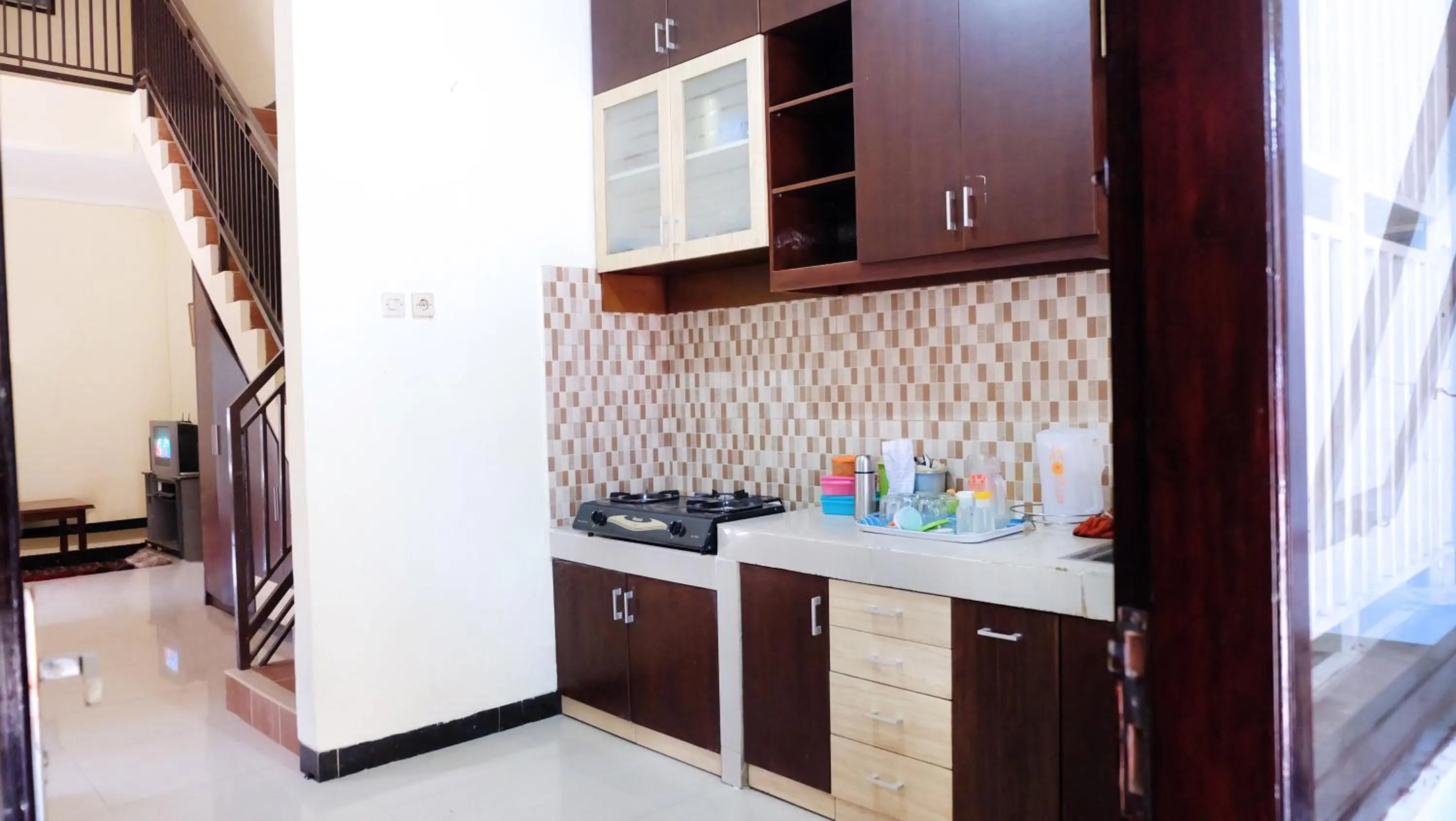 Kitchen or kitchenette in Homestay Tegal Kota by Simply Homy
