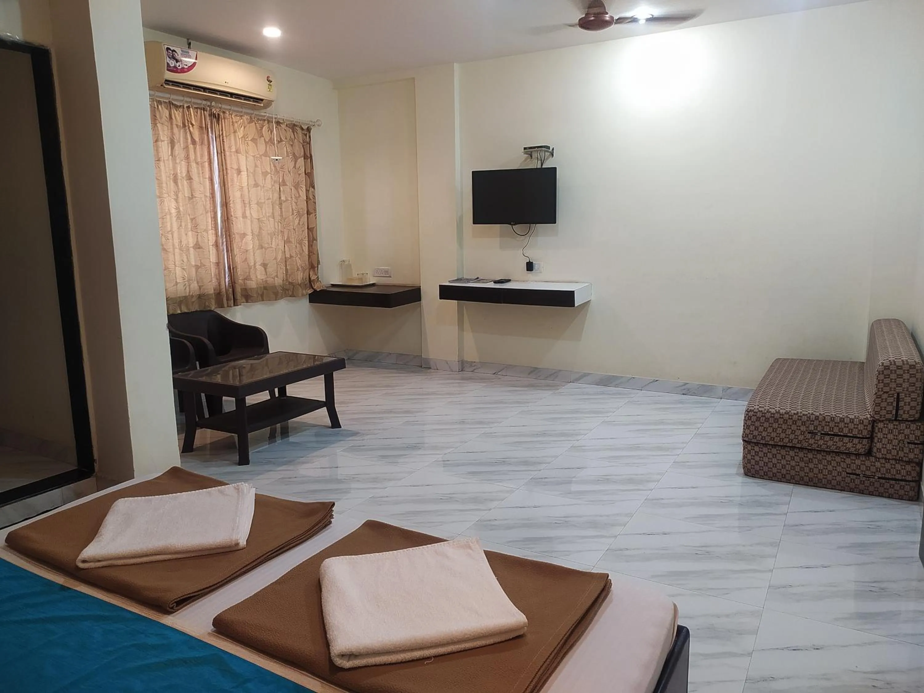 Bedroom in Sea Winds Hotel, Guhagar