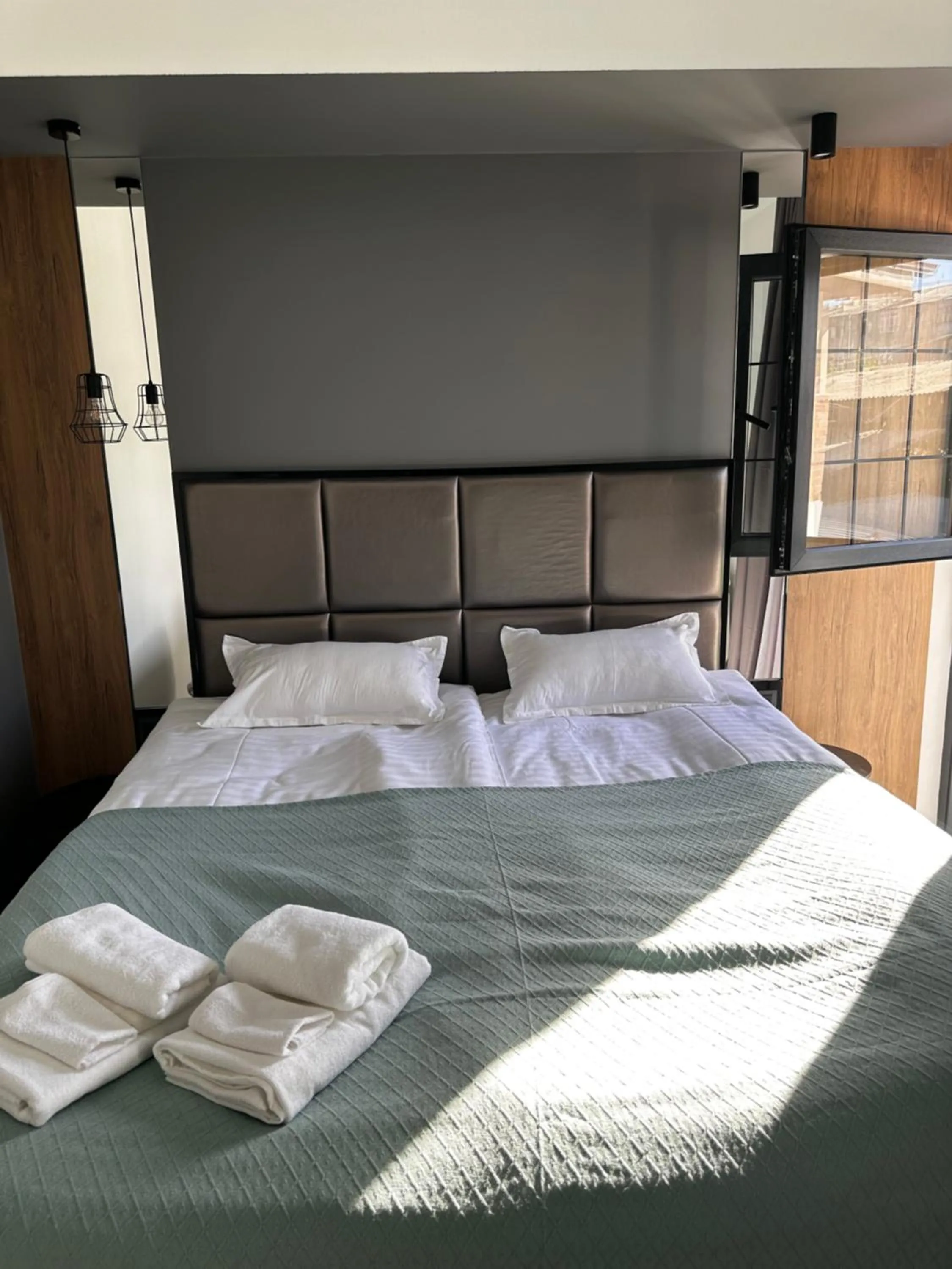 Bed in Garden Lounge Hotel