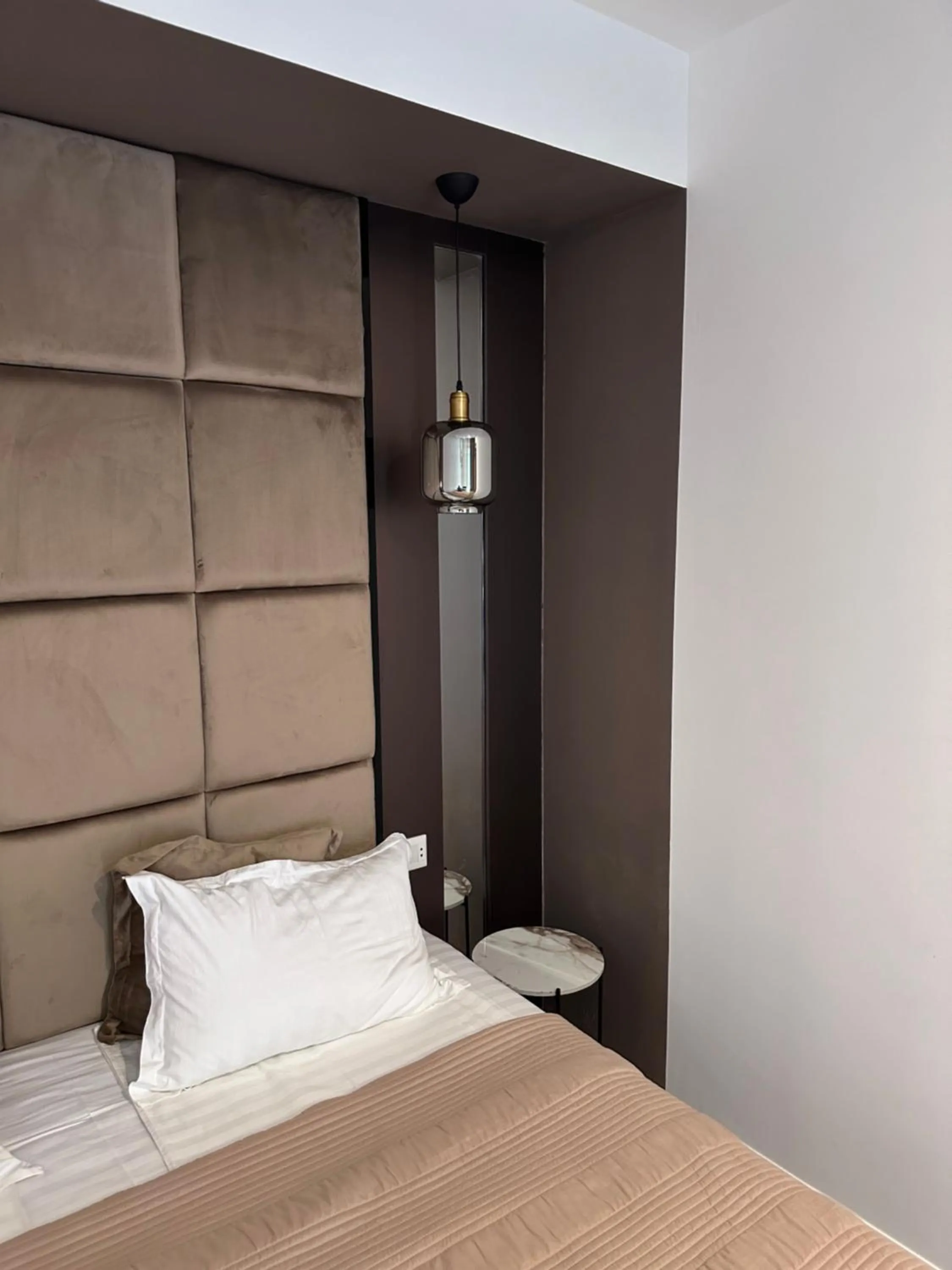 Bed in Garden Lounge Hotel