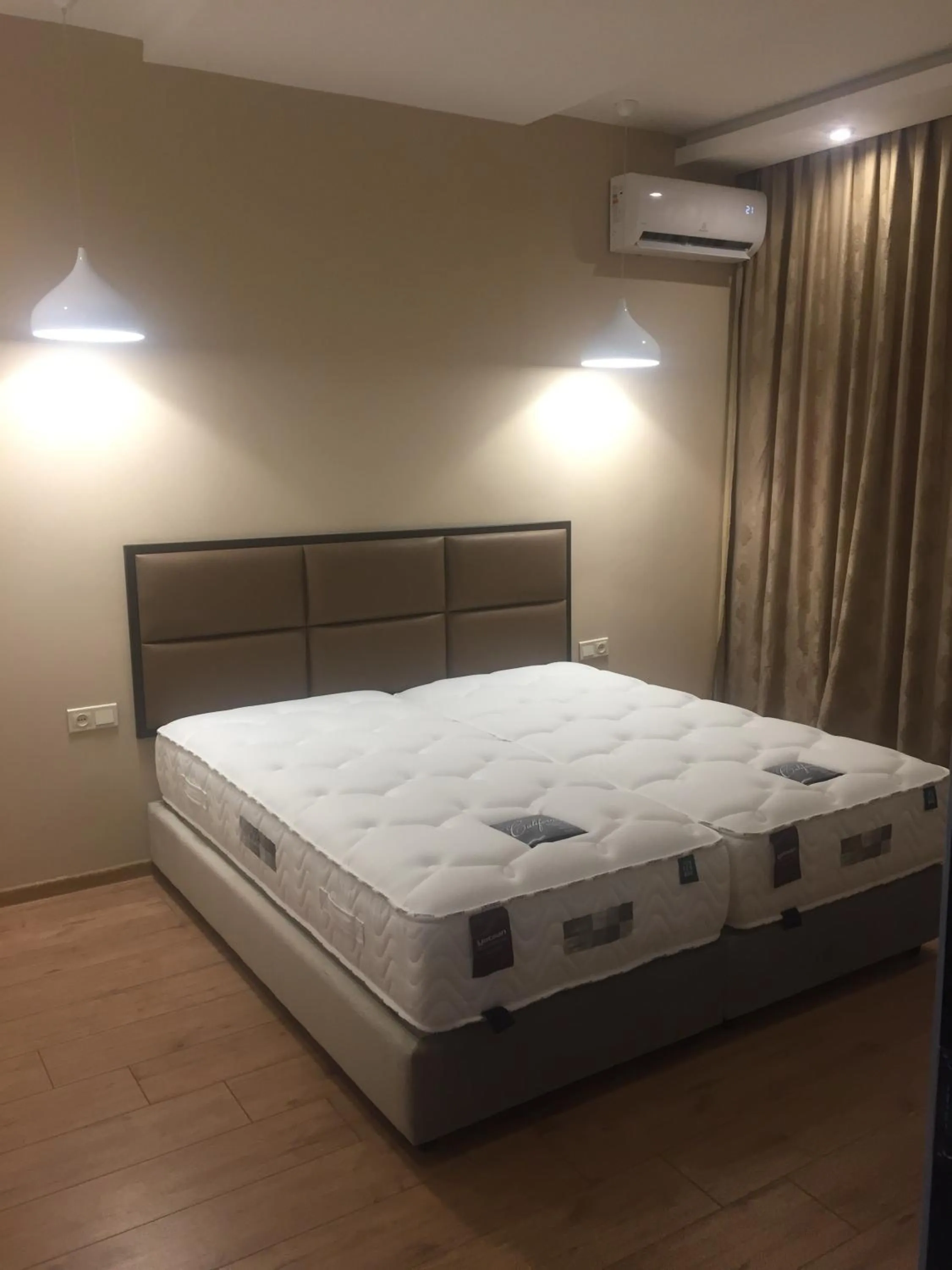 Bed in Garden Lounge Hotel