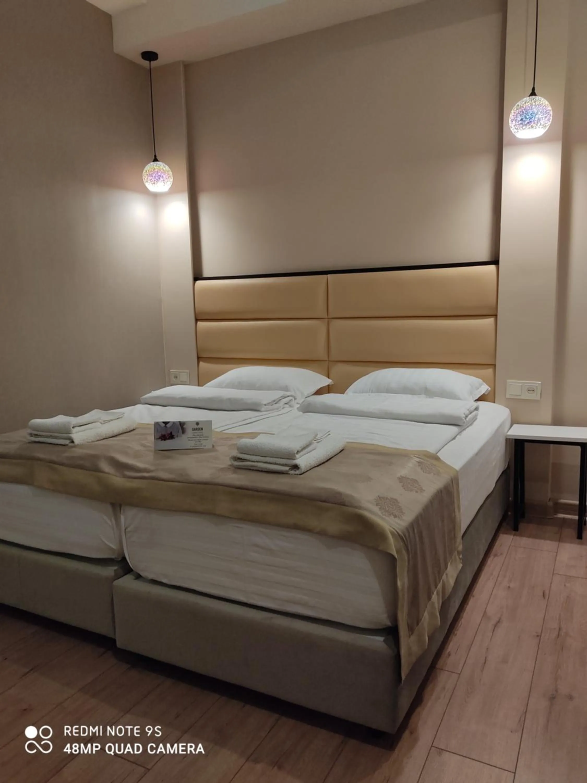 Bed in Garden Lounge Hotel