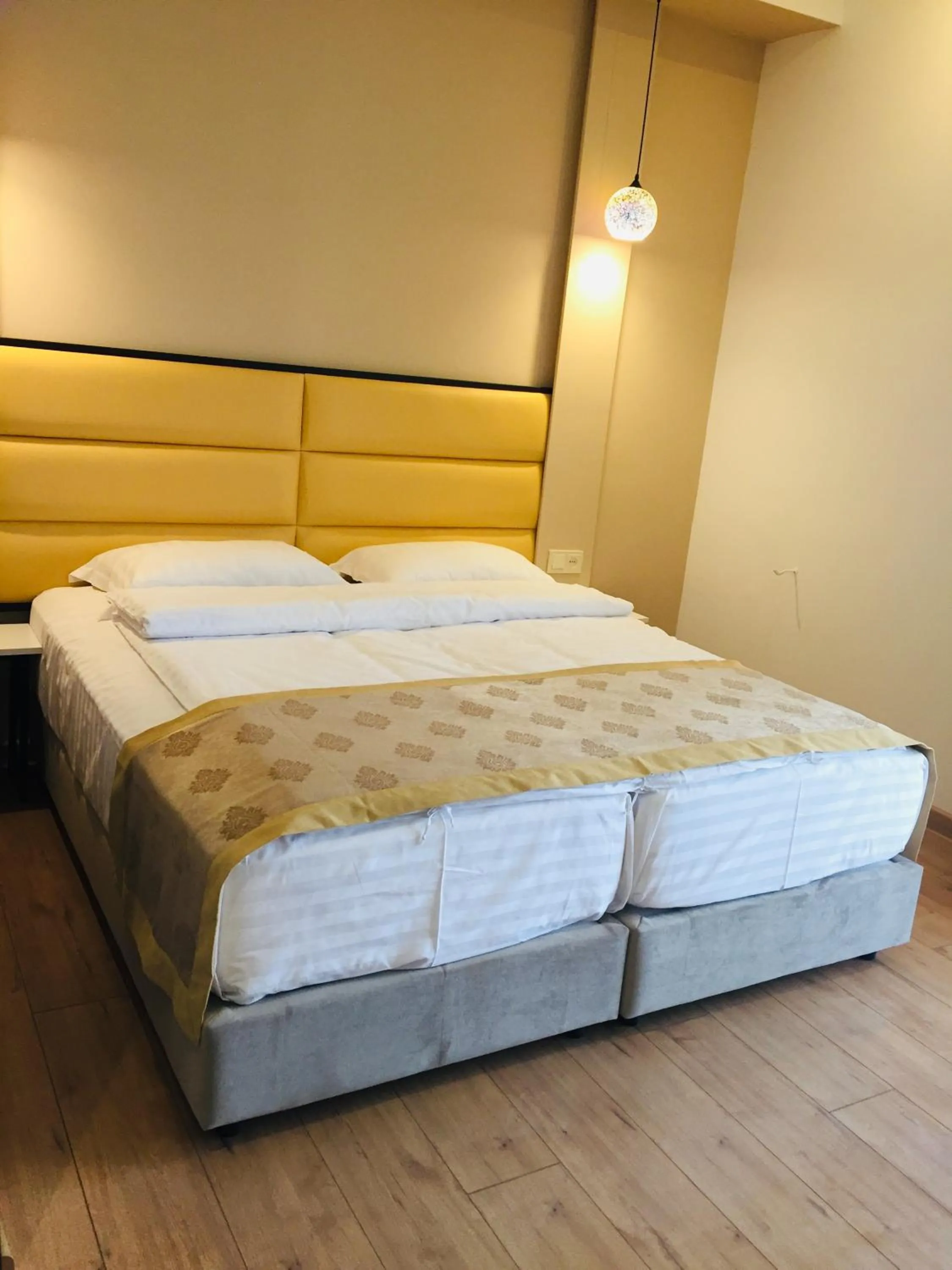 Bed in Garden Lounge Hotel