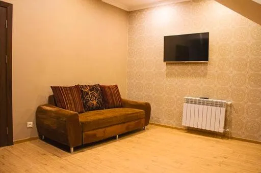 Communal lounge/ TV room in Garden Lounge Hotel