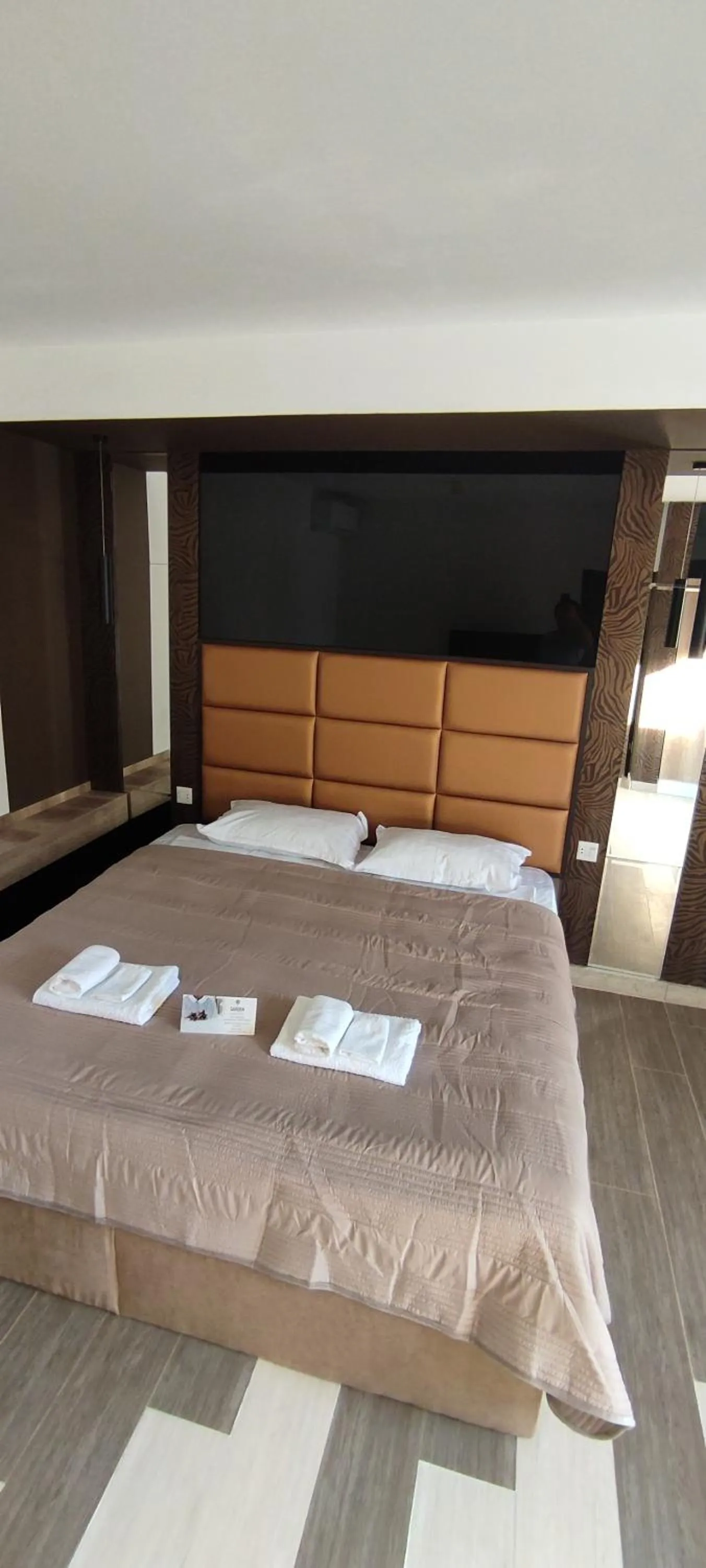 Bed in Garden Lounge Hotel