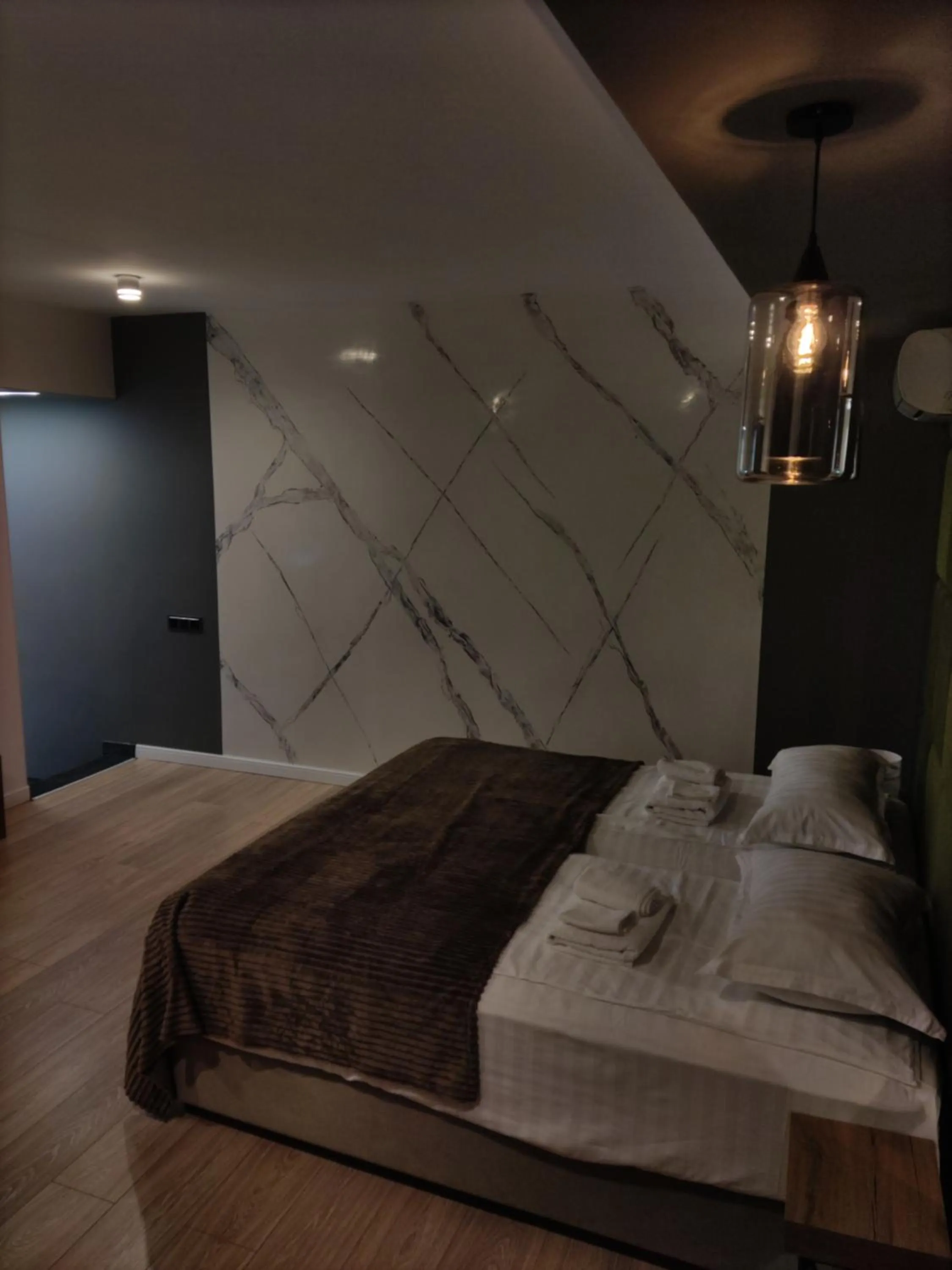 Bed in Garden Lounge Hotel