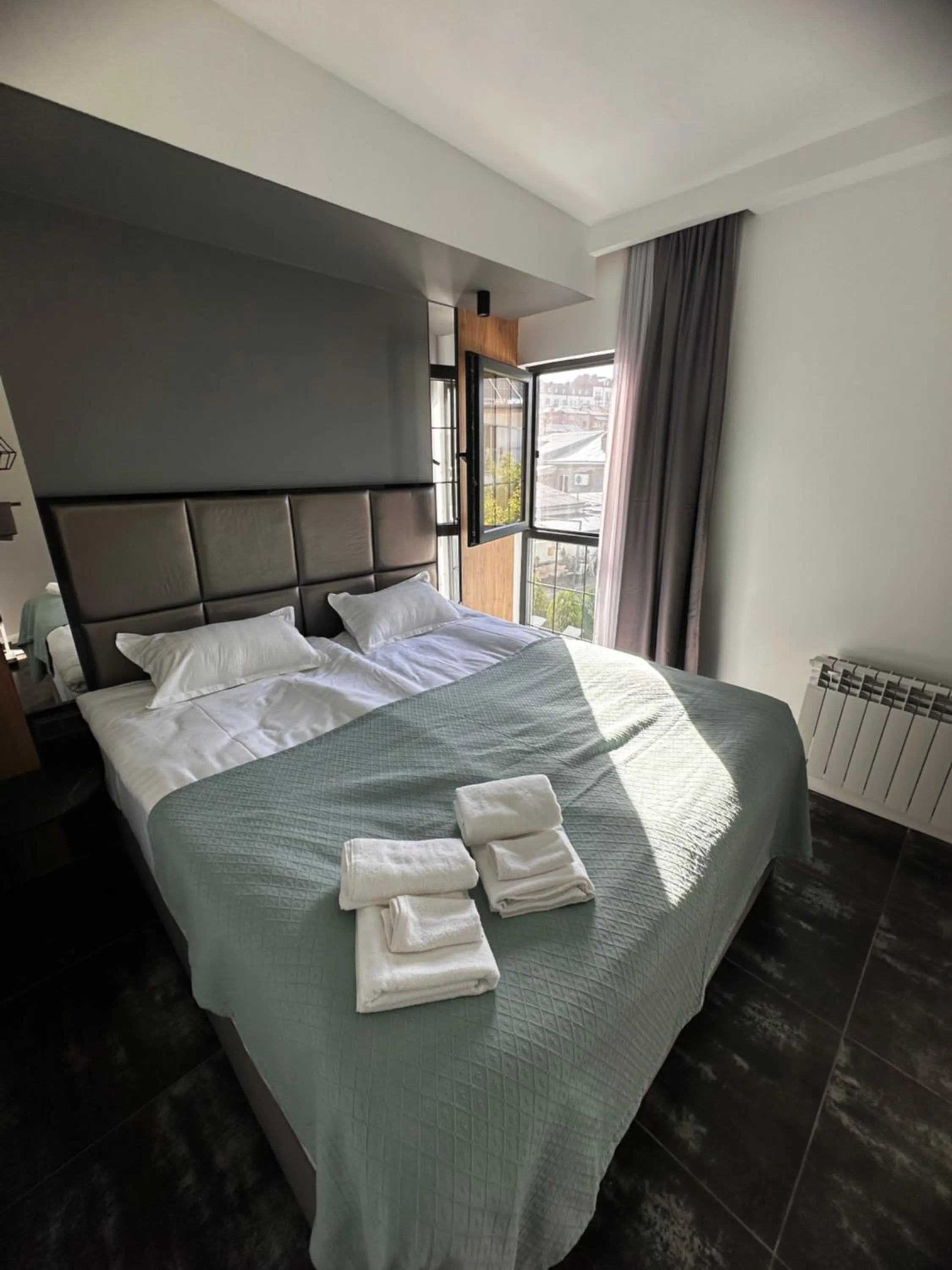 Bed in Garden Lounge Hotel