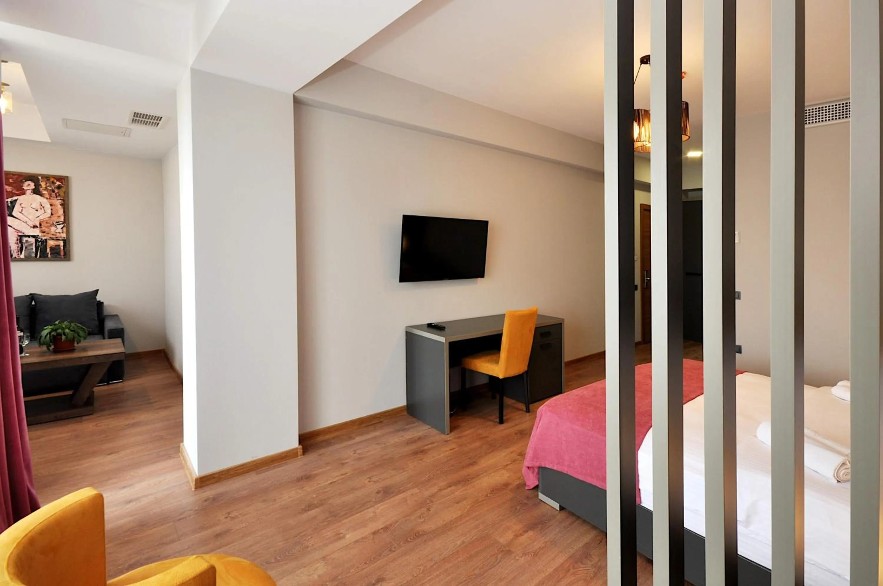 Seating area, Bed in Jazz Hotel