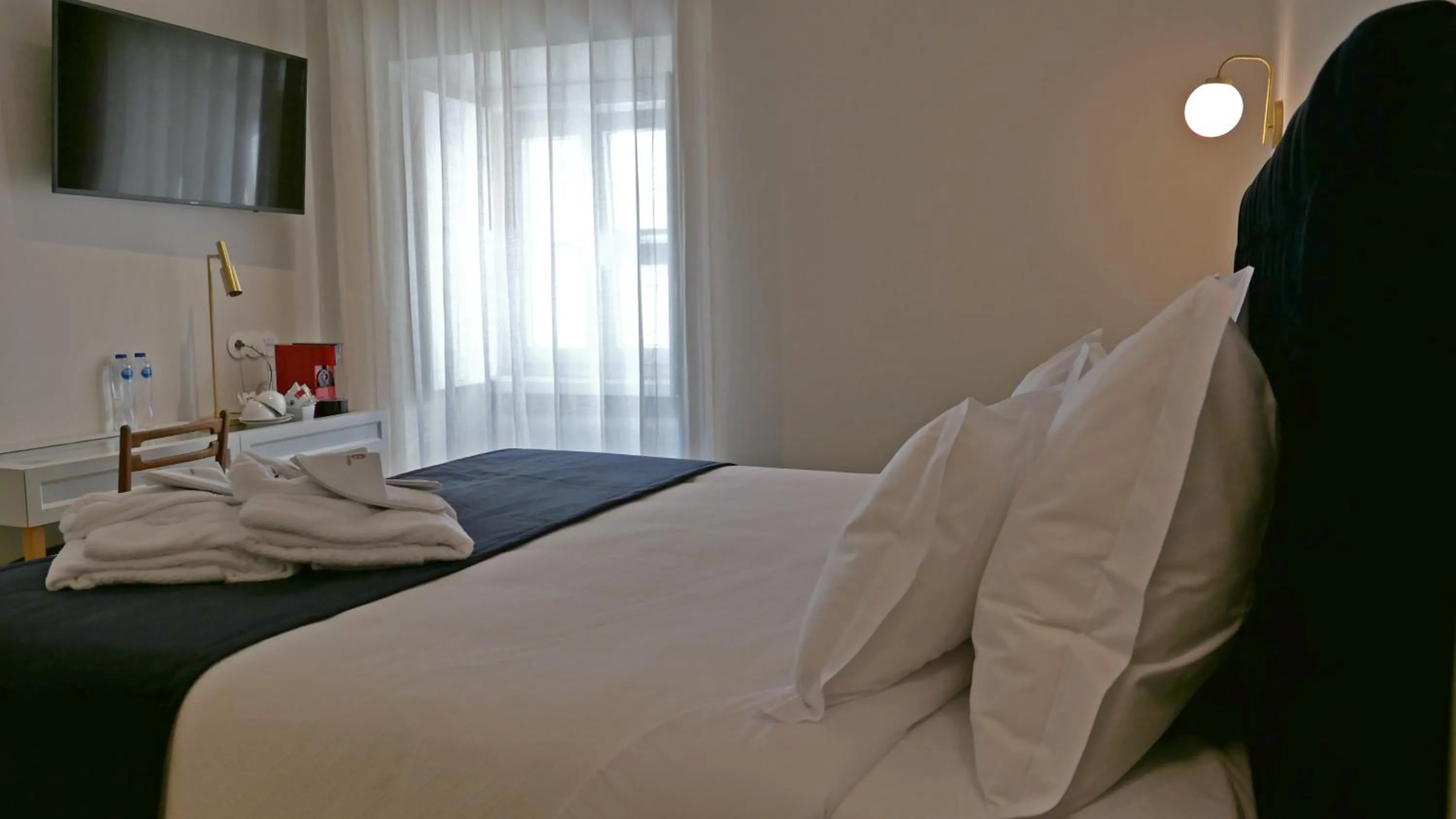 Bed in Casa dos Ofícios Hotel