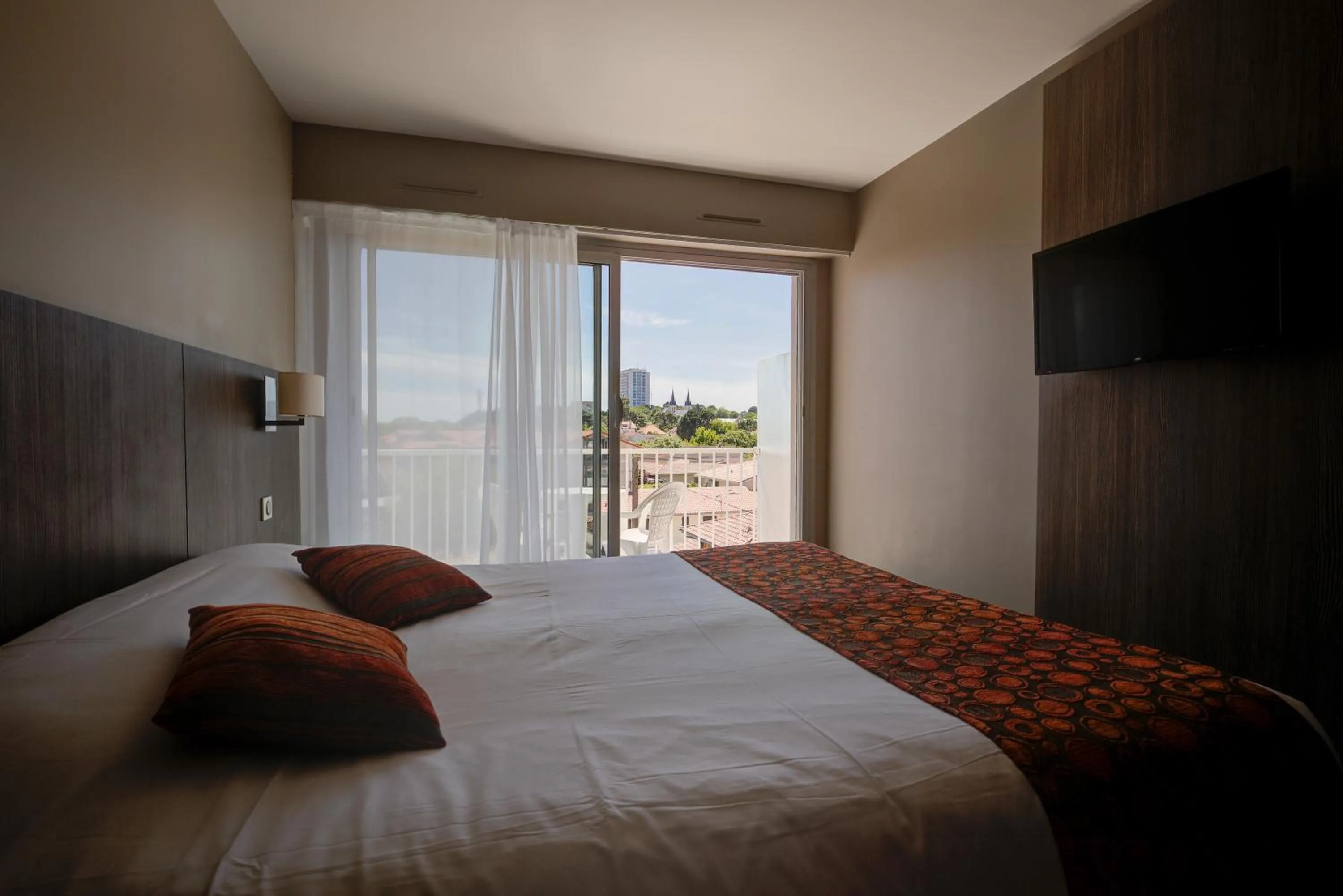 Bed in Hôtel Le Nautic