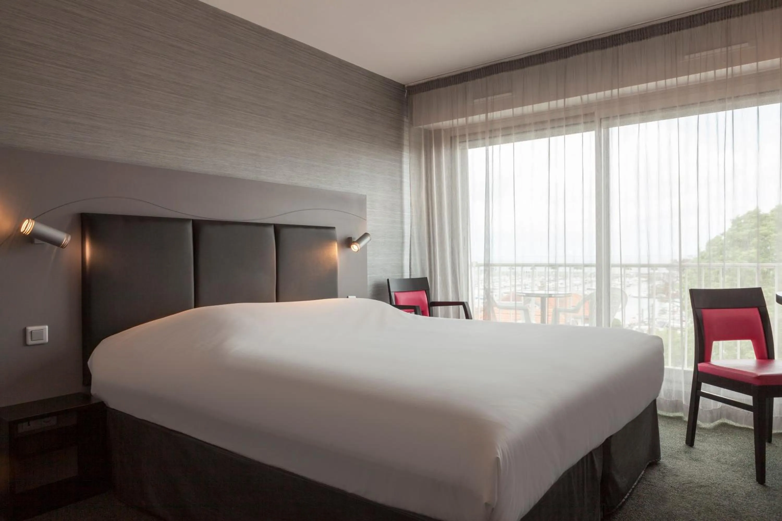 Photo of the whole room, Bed in Hôtel Le Nautic