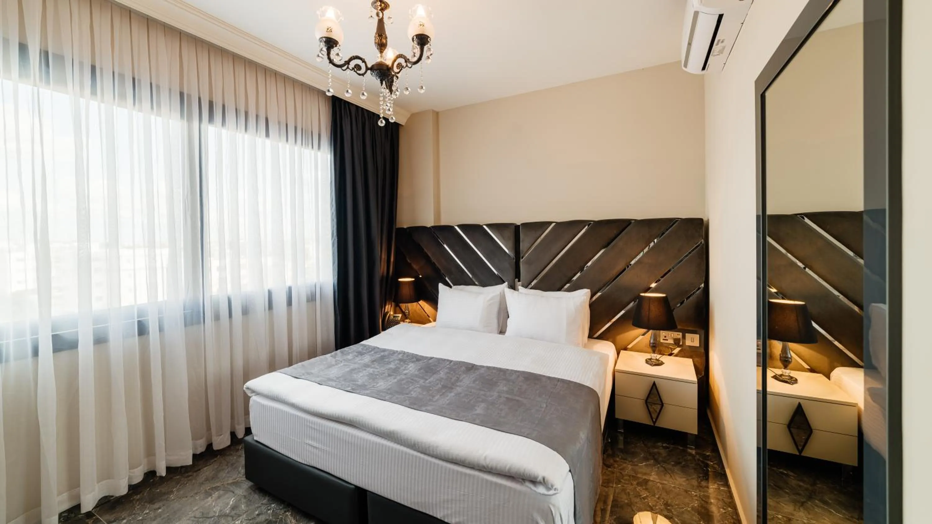 Bed in Royal Palace Hotel