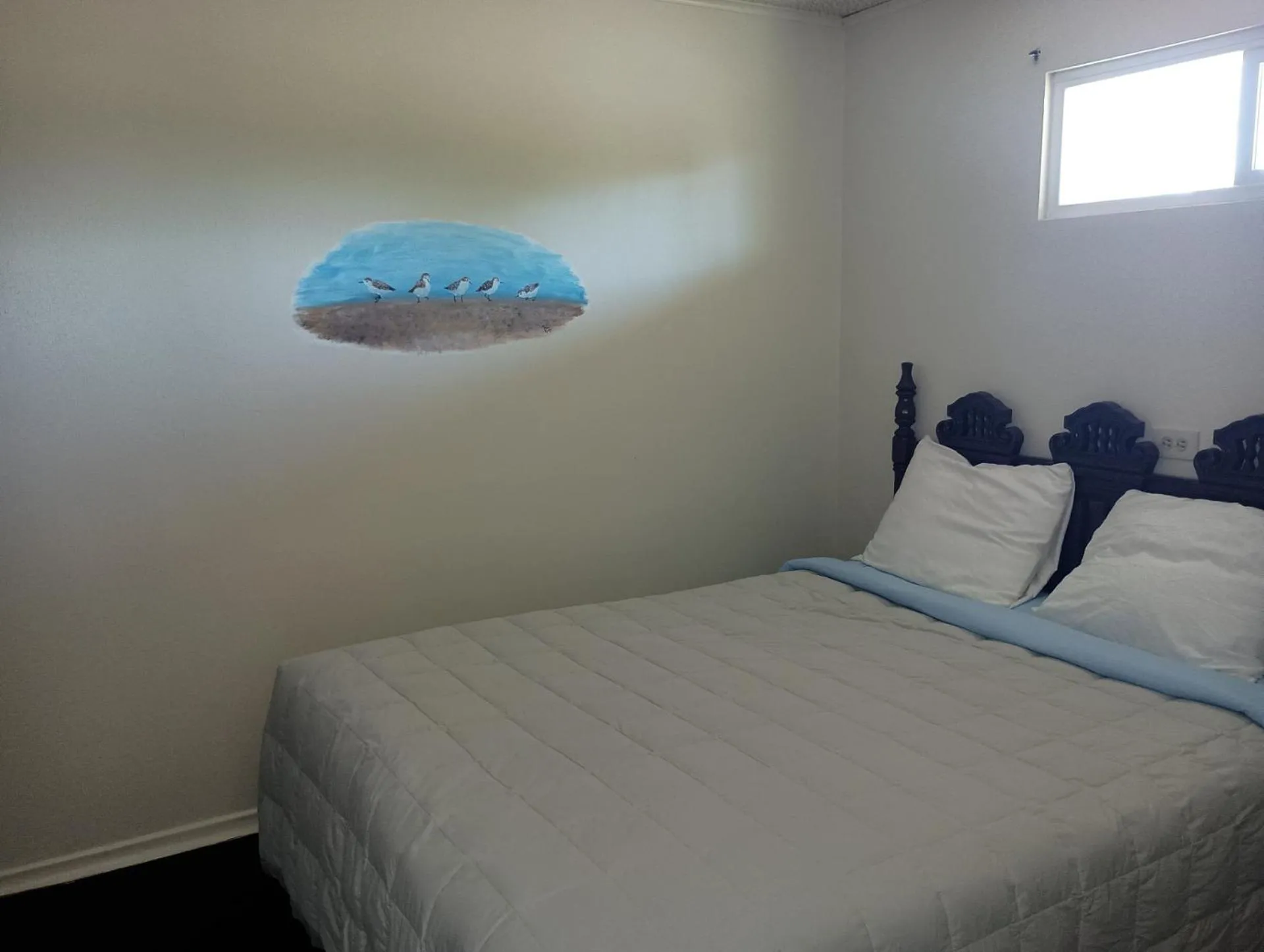 Bed in Ocean Avenue Inn