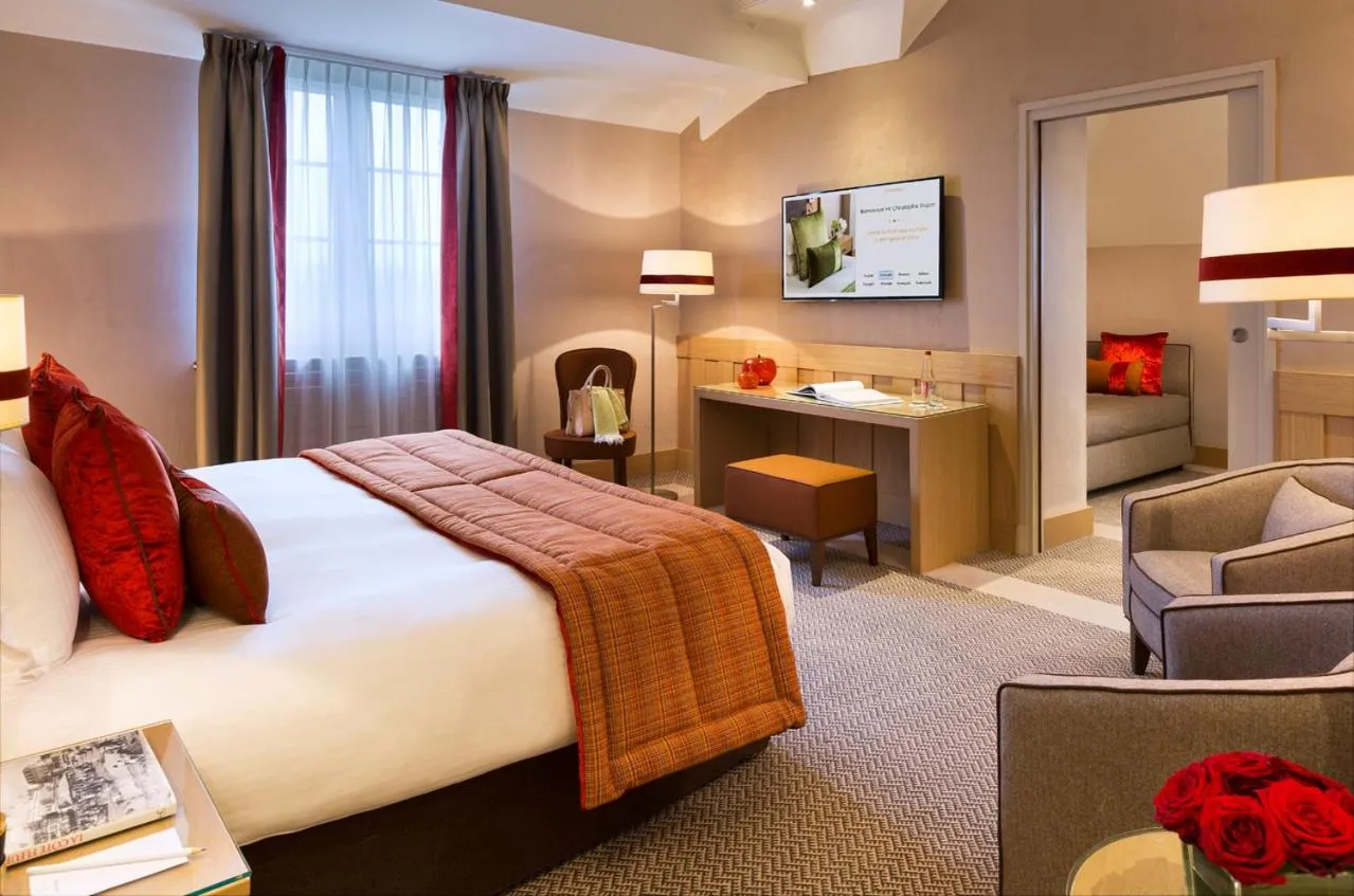 Photo of the whole room, Bed in Hôtel Barrière L'Hôtel du Golf