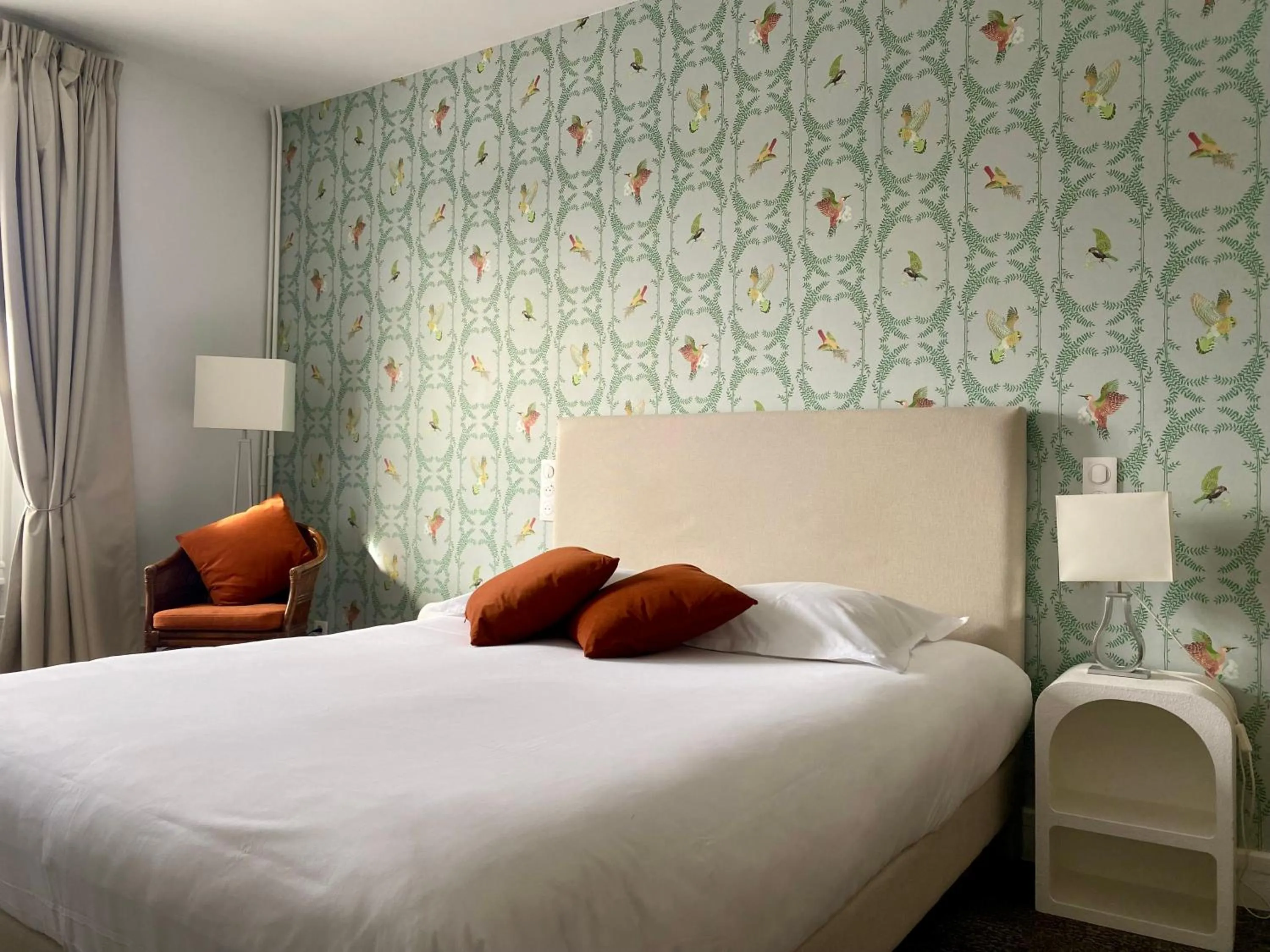 Bed in Logis Hôtel Marguerite