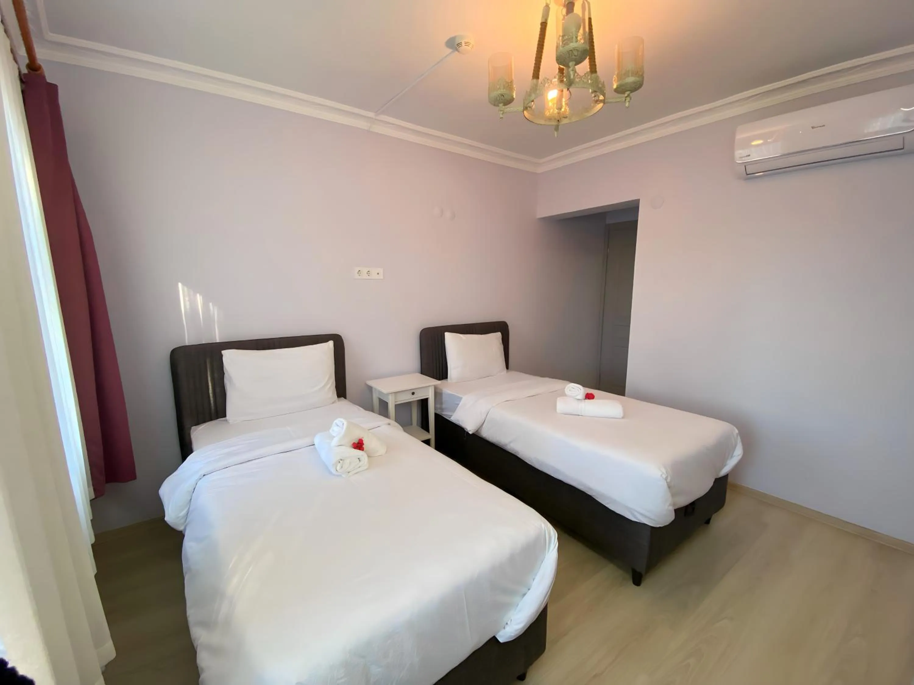 Bed in Queen Bee Hotel