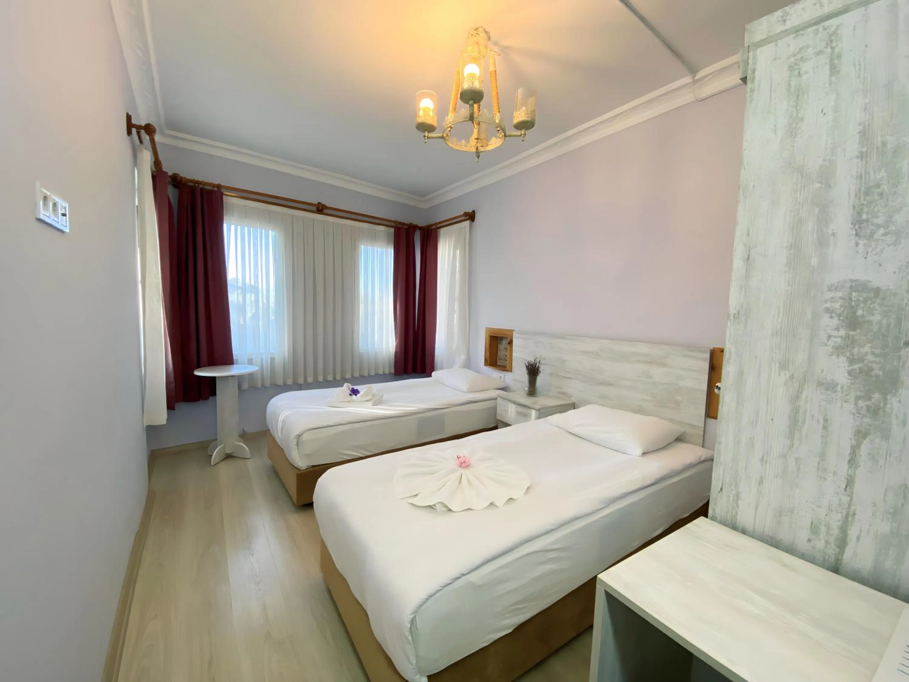 Bed in Queen Bee Hotel