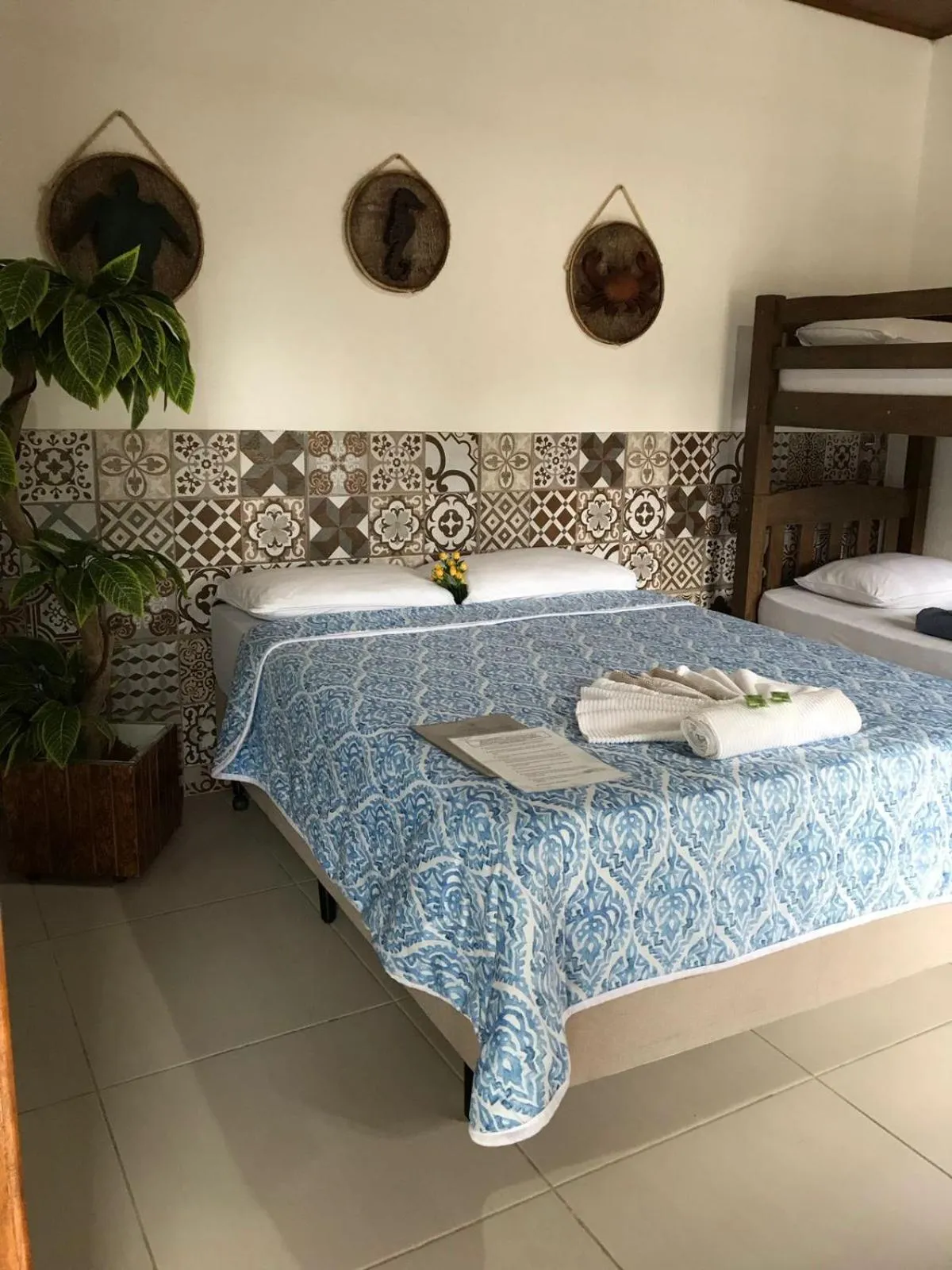 Bed in Pousada Armação das Baleias