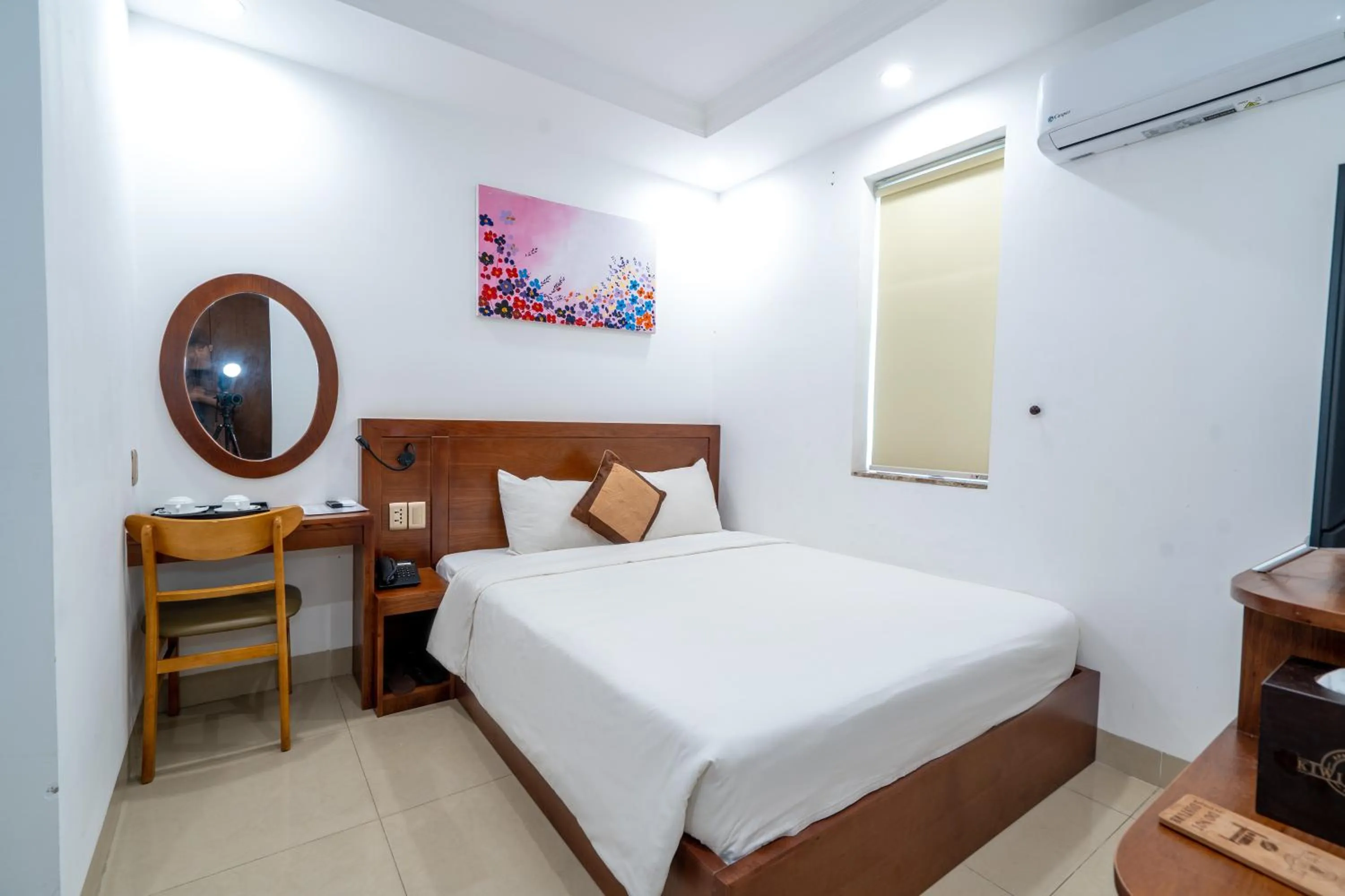 Bed in K Hotel Sauna and Massage