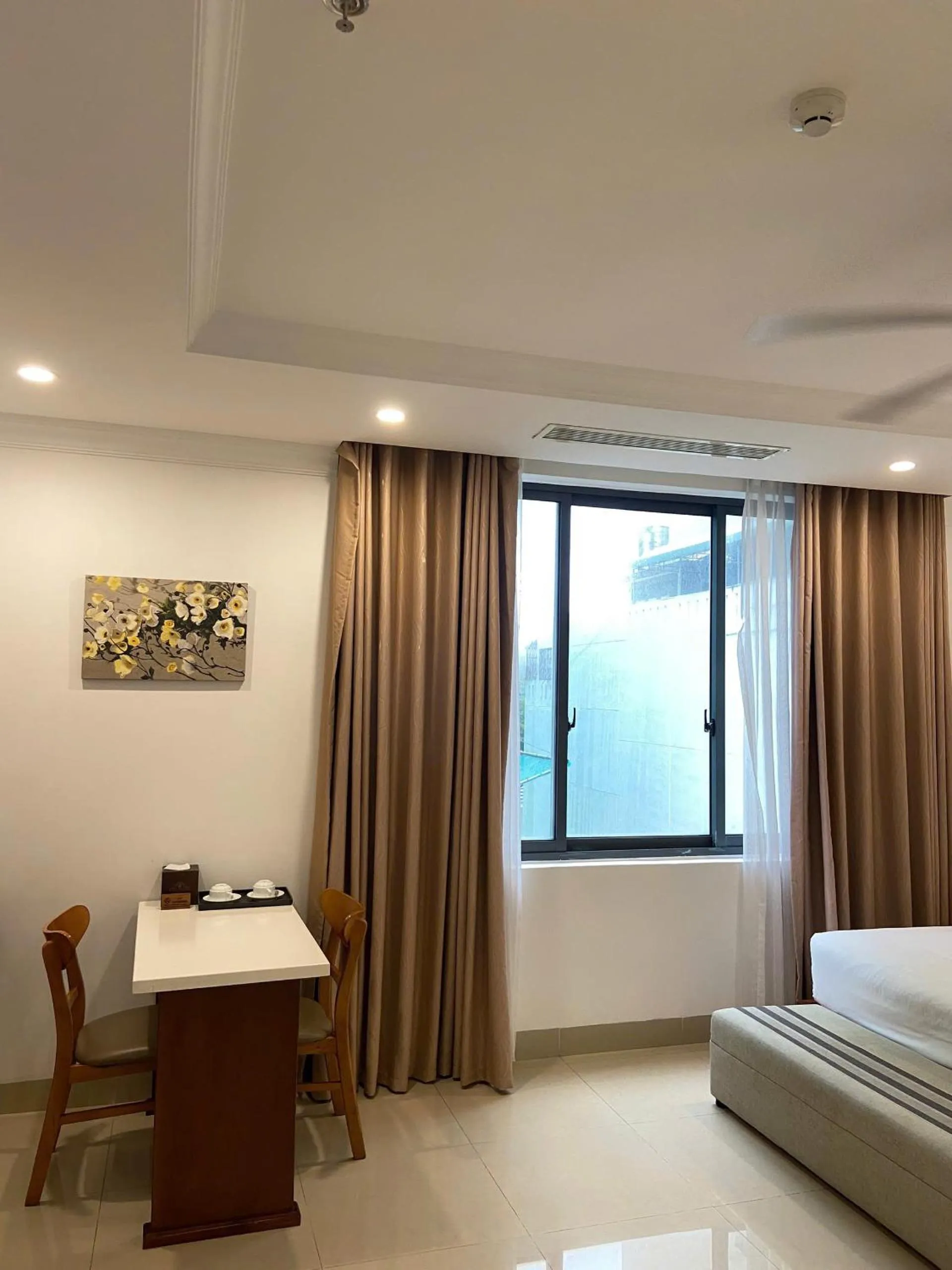 Bed in K Hotel Sauna and Massage