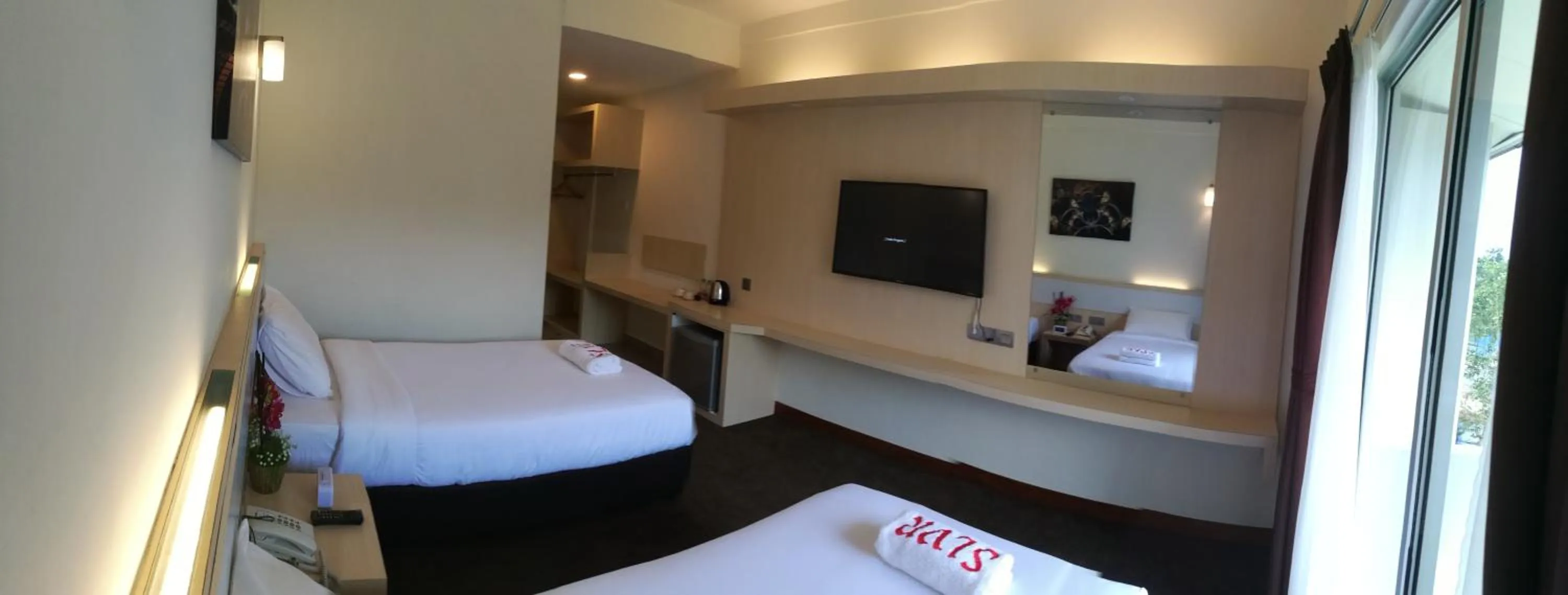 Bed in SERDANG LAKE VIEW RESORT