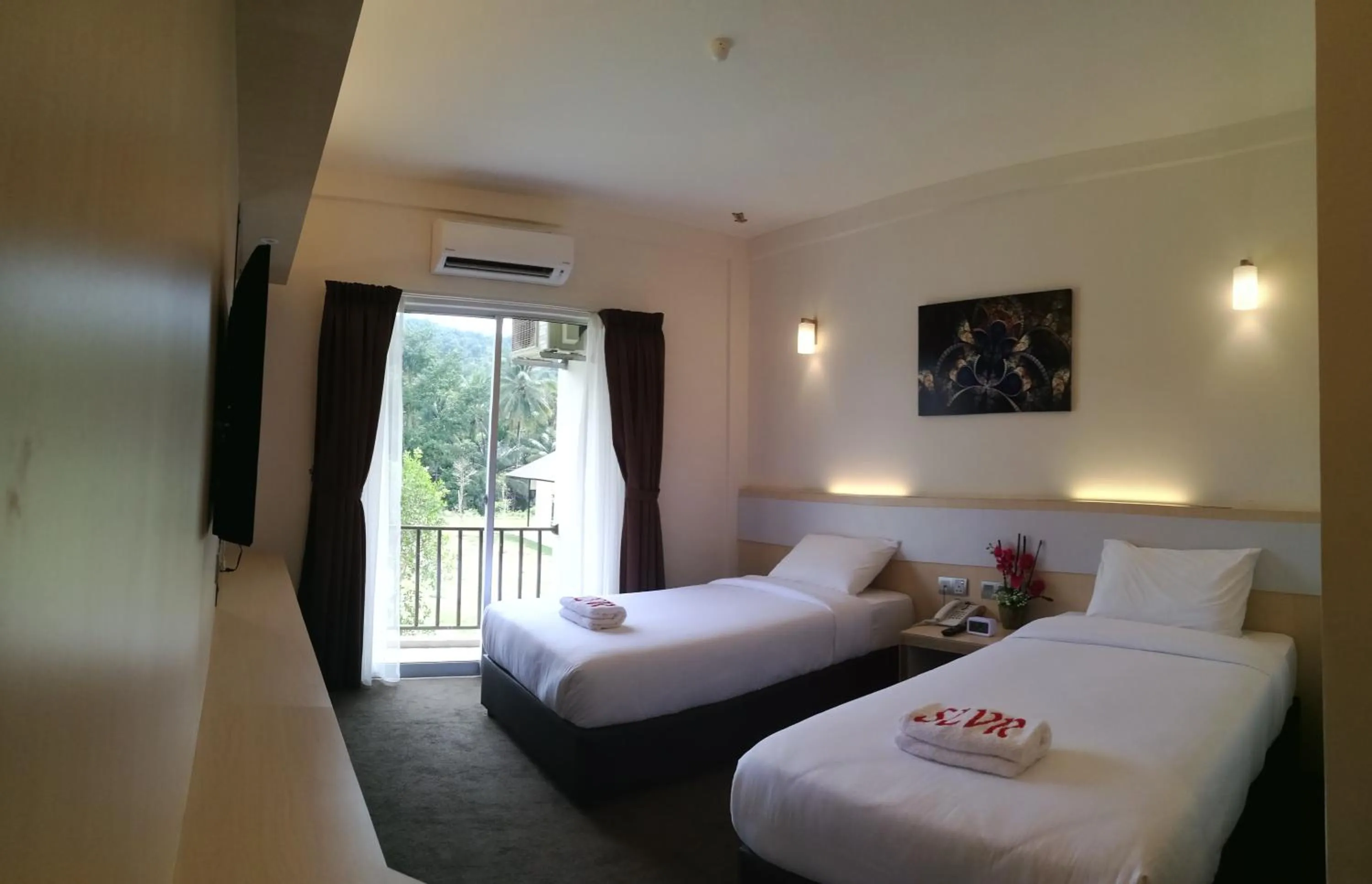 Bed in SERDANG LAKE VIEW RESORT