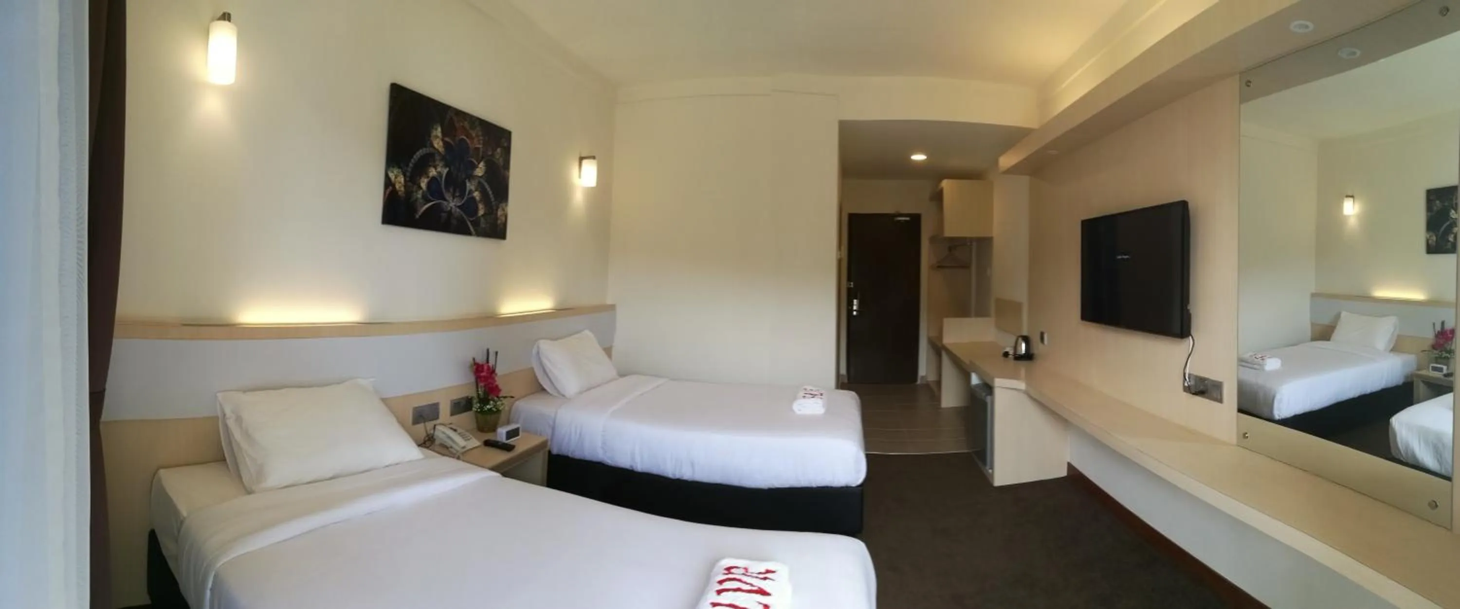 Bed in SERDANG LAKE VIEW RESORT