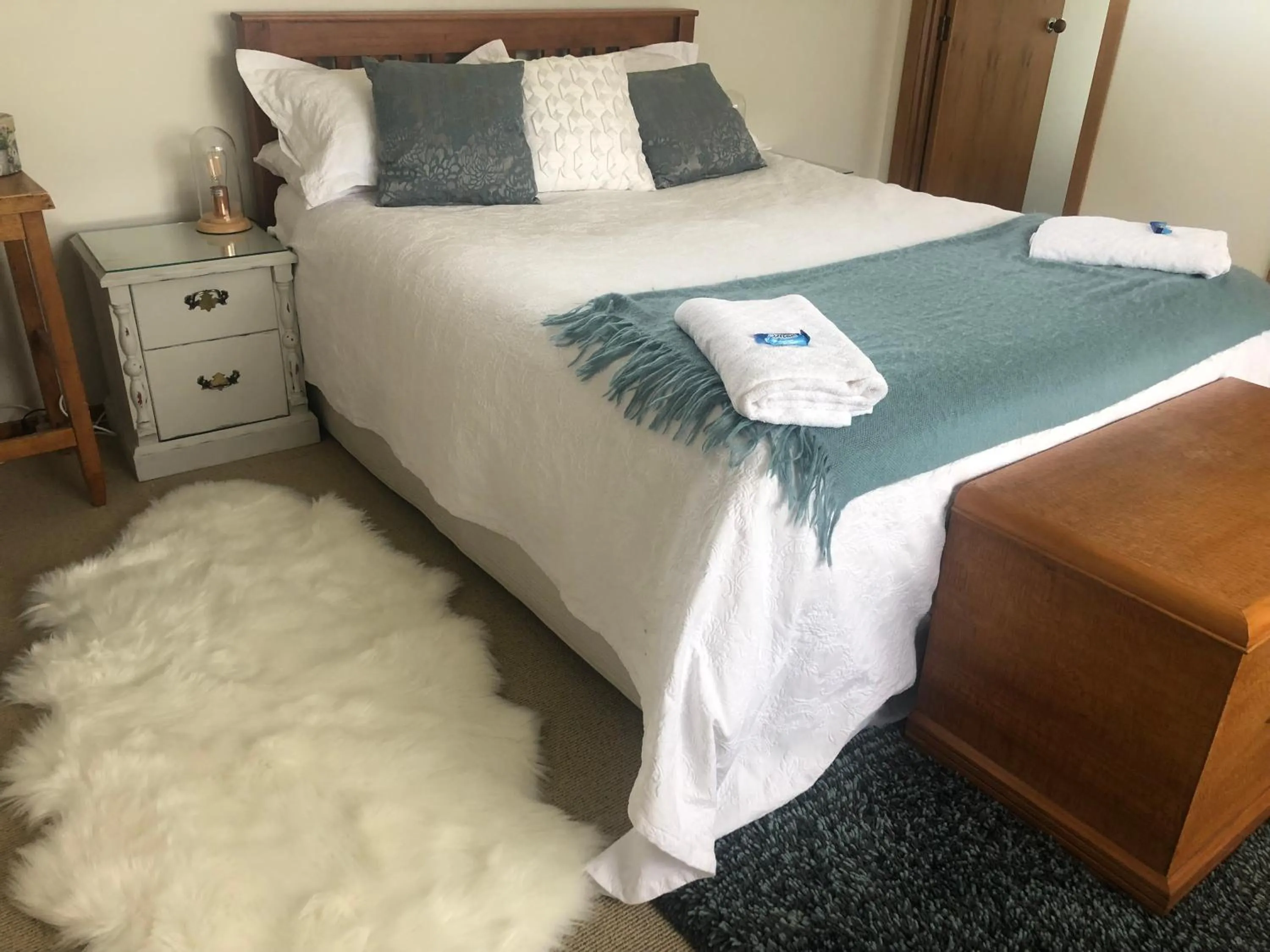 Bed in Southland Organic Farmstay