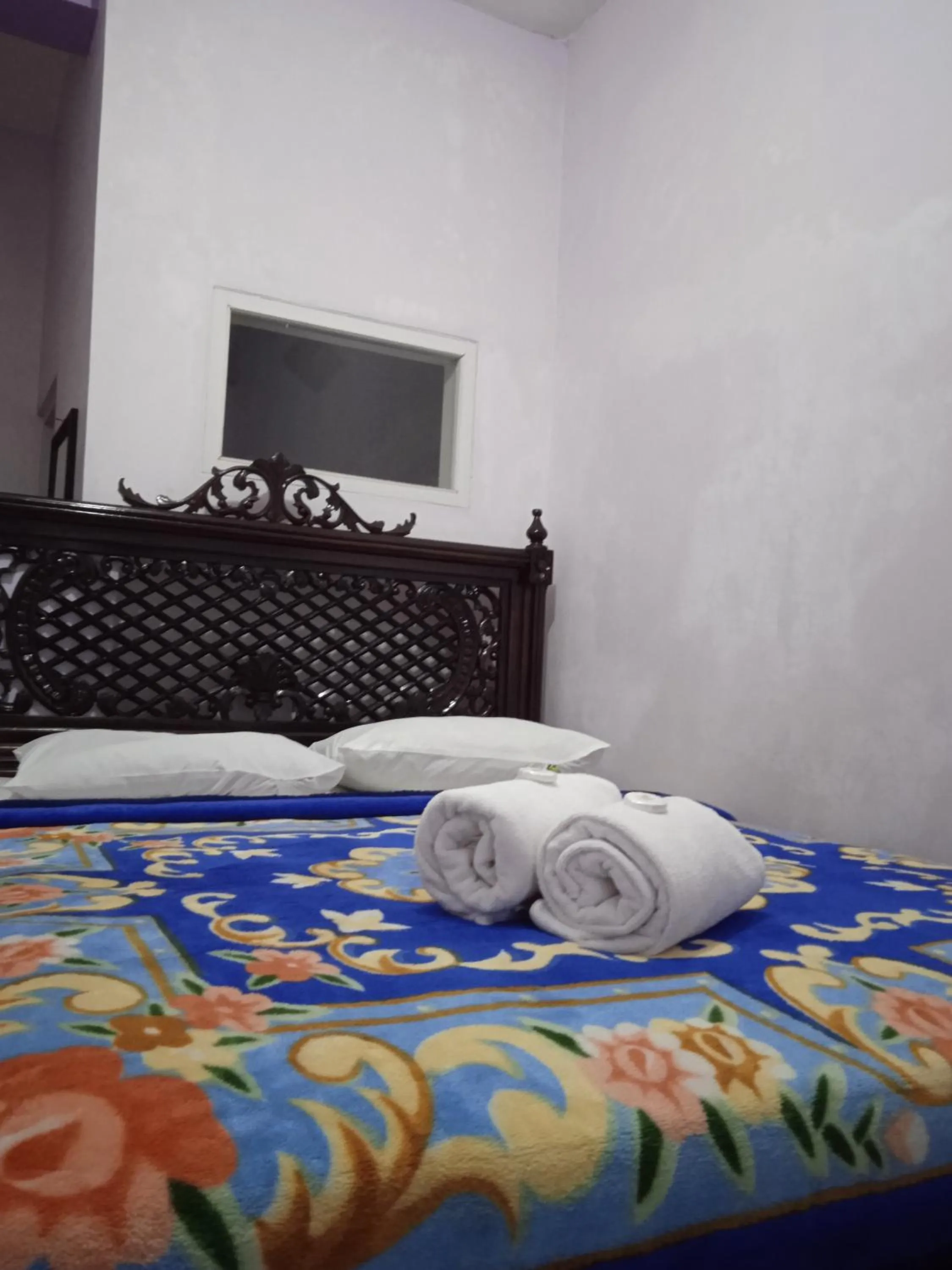 Bed in Trivadoh Syariah Hotel