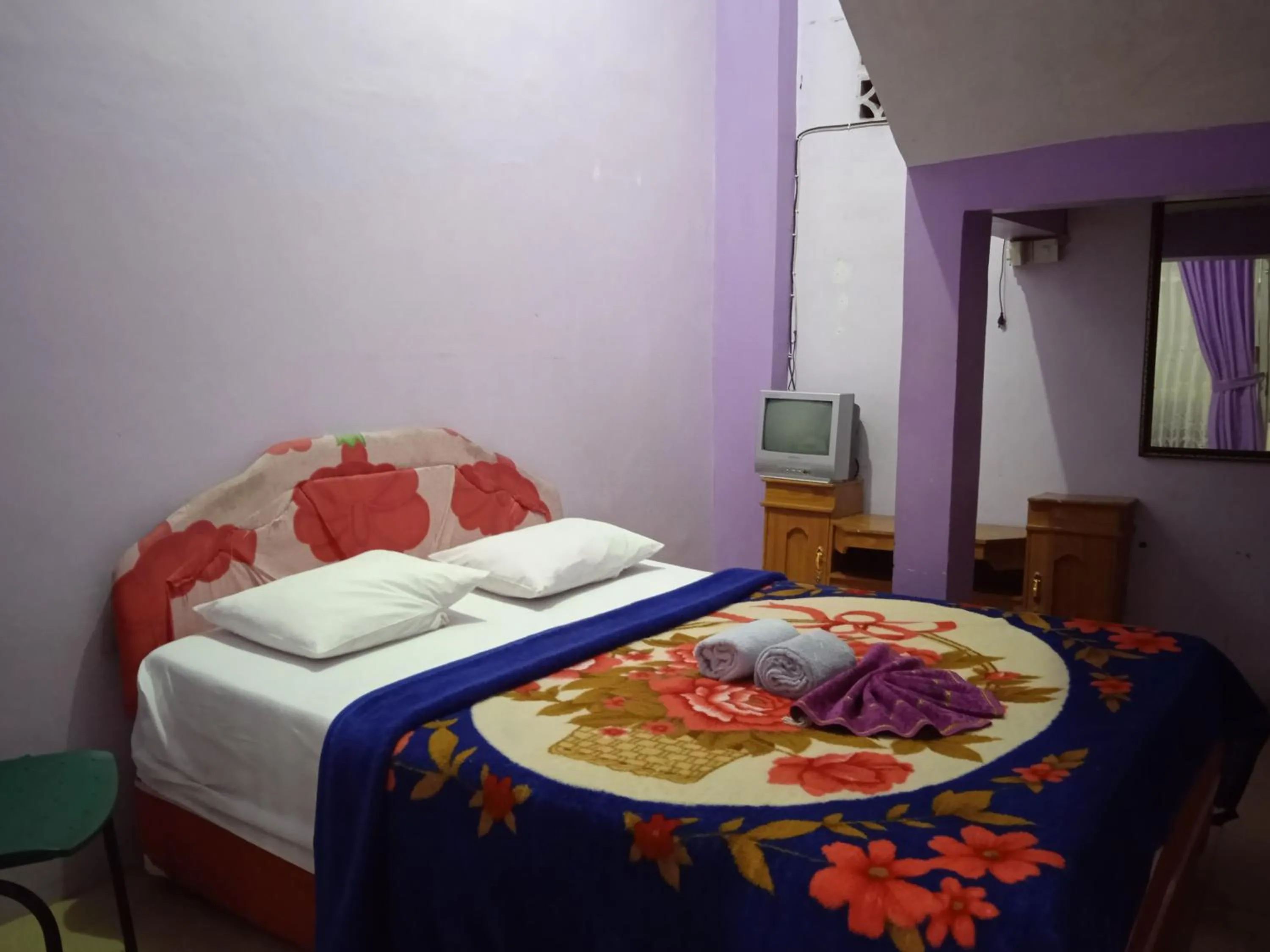 Bedroom in Trivadoh Syariah Hotel