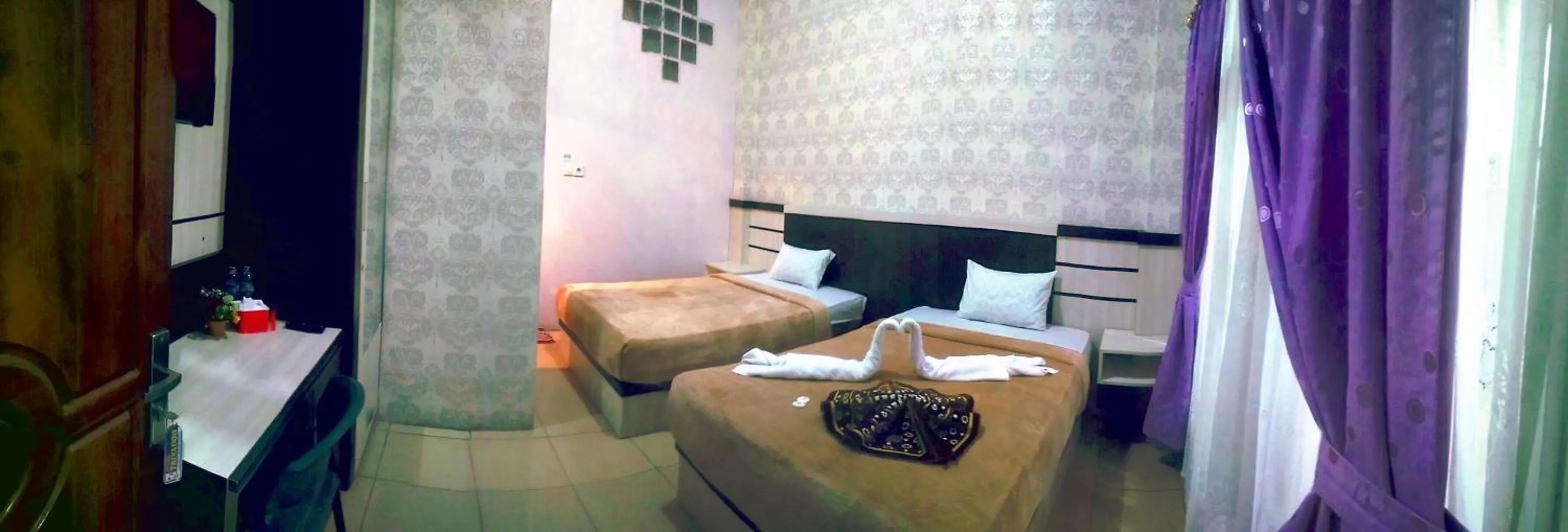 Bedroom in Trivadoh Syariah Hotel