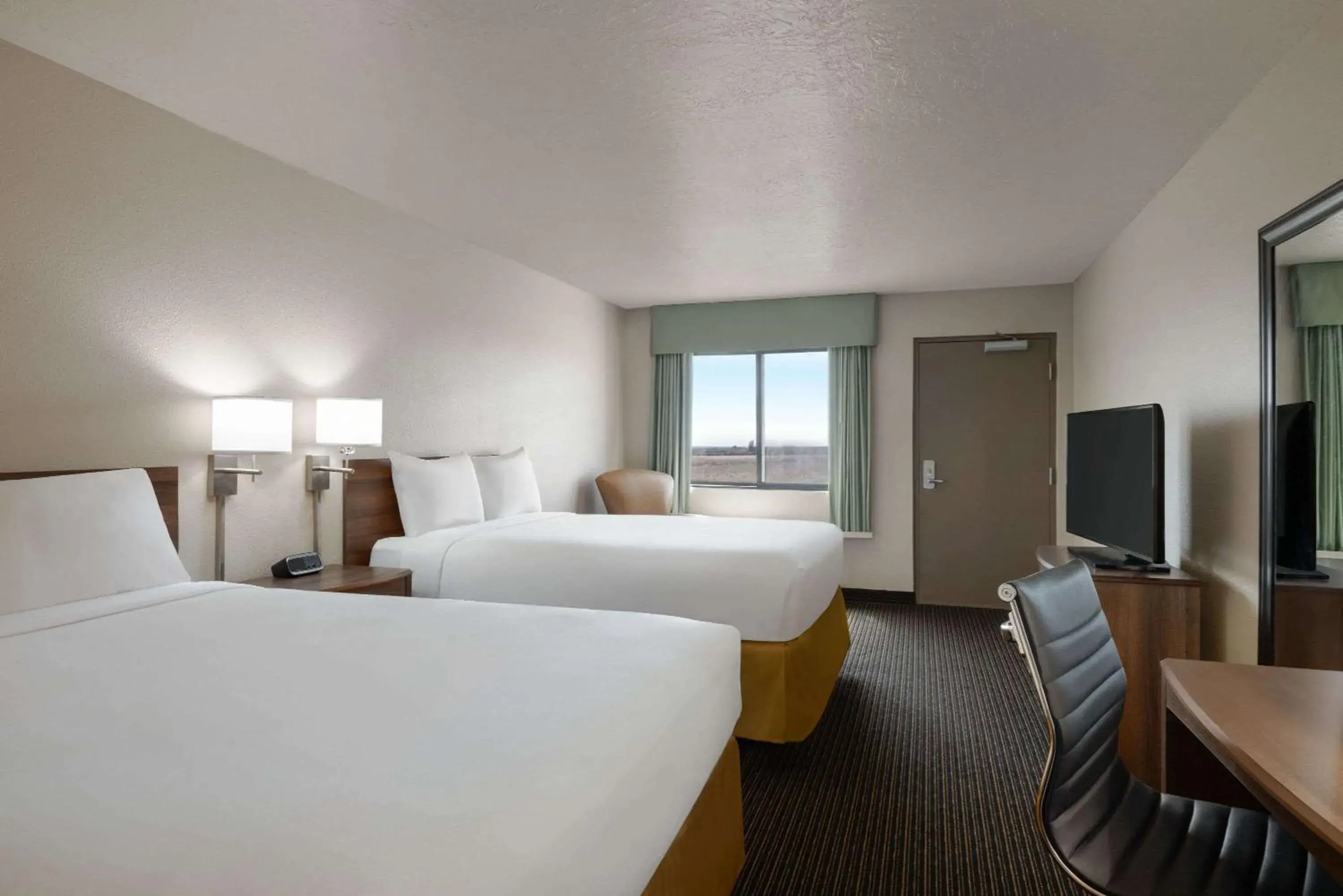 Queen Room with Two Queen Beds - Non-Smoking in Travelodge by Wyndham Vaughn Queen Room with Two Queen Beds - Non-Smoking in Travelodge by Wyndham Vaughn