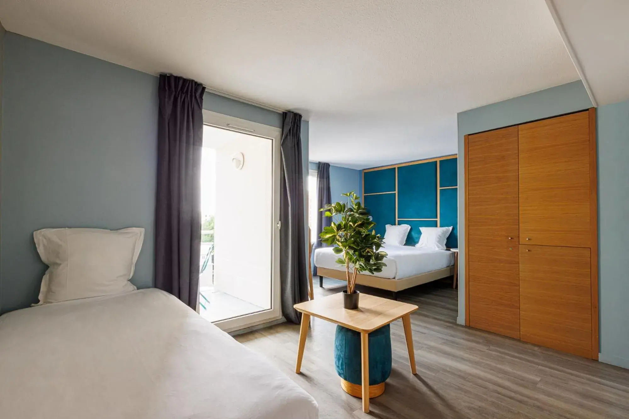 Triple Room with Balcony in Hôtel Sanso by HappyCulture Triple Room with Balcony in Hôtel Sanso by HappyCulture