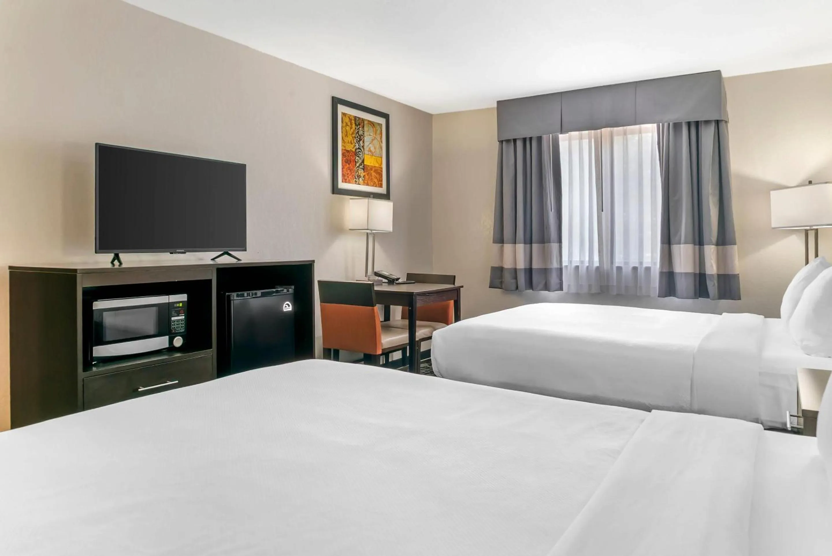 Bedroom, Bed in Quality Inn Grand Rapids South-Byron Center