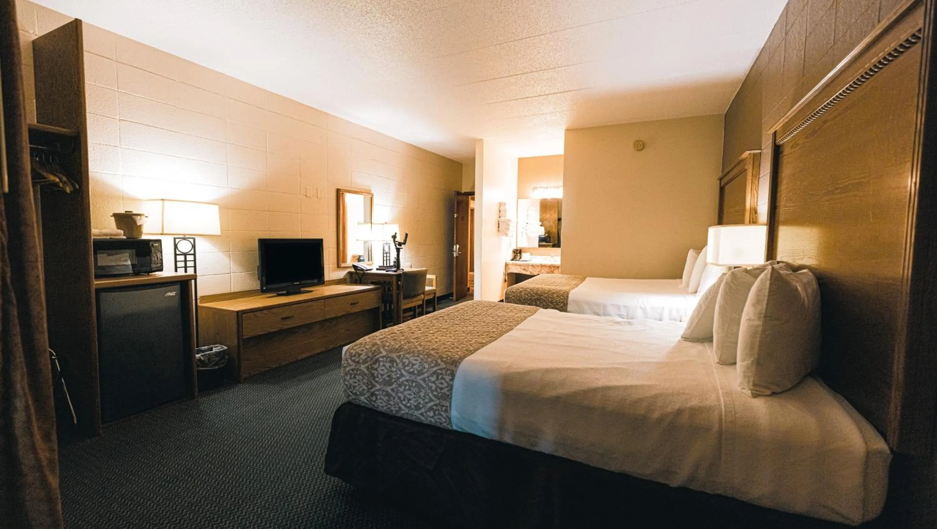 Bedroom, Bed in Wrangler Inn Mobridge