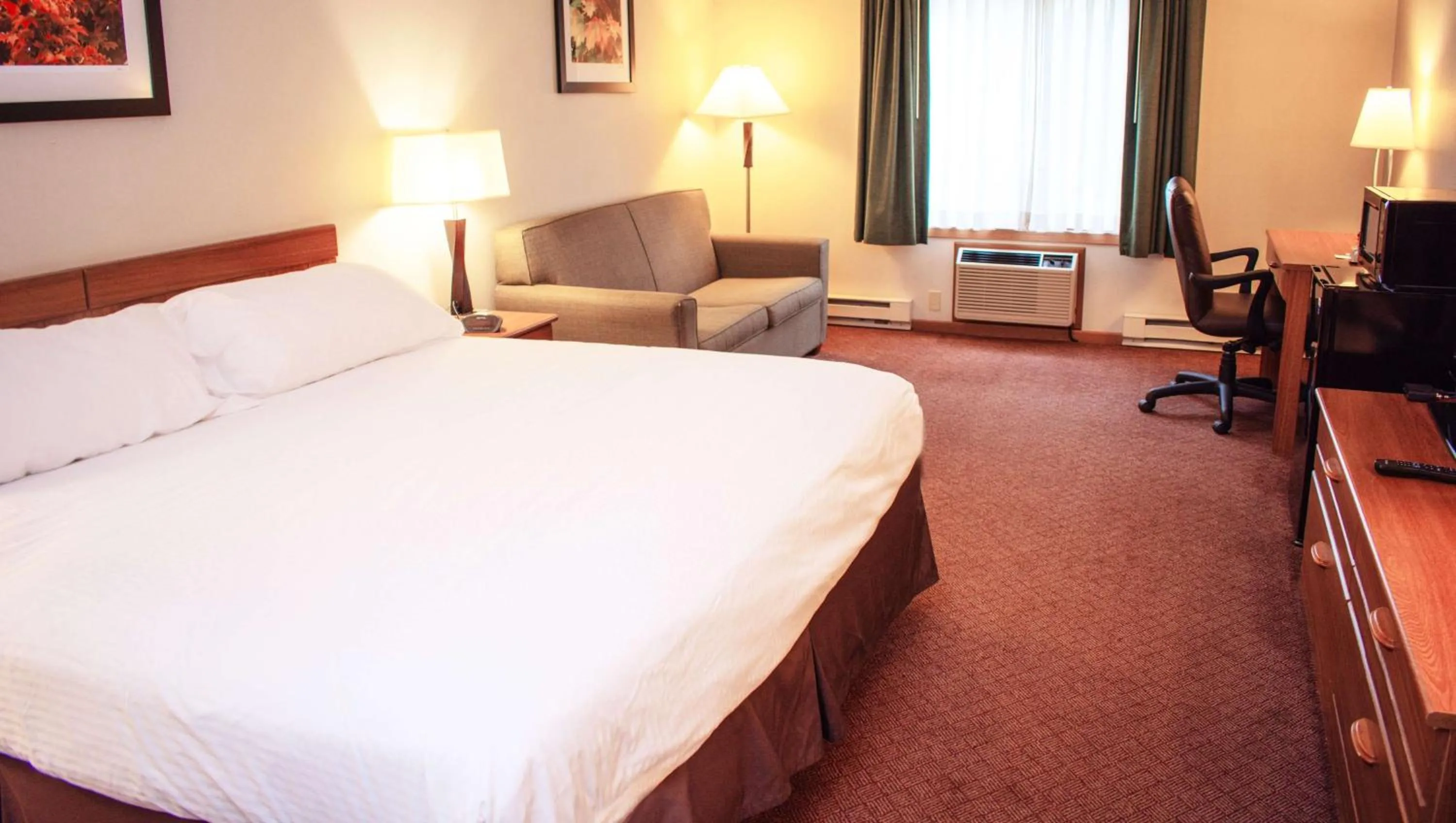 Photo of the whole room, Bed in Magnuson Hotel Country Inn