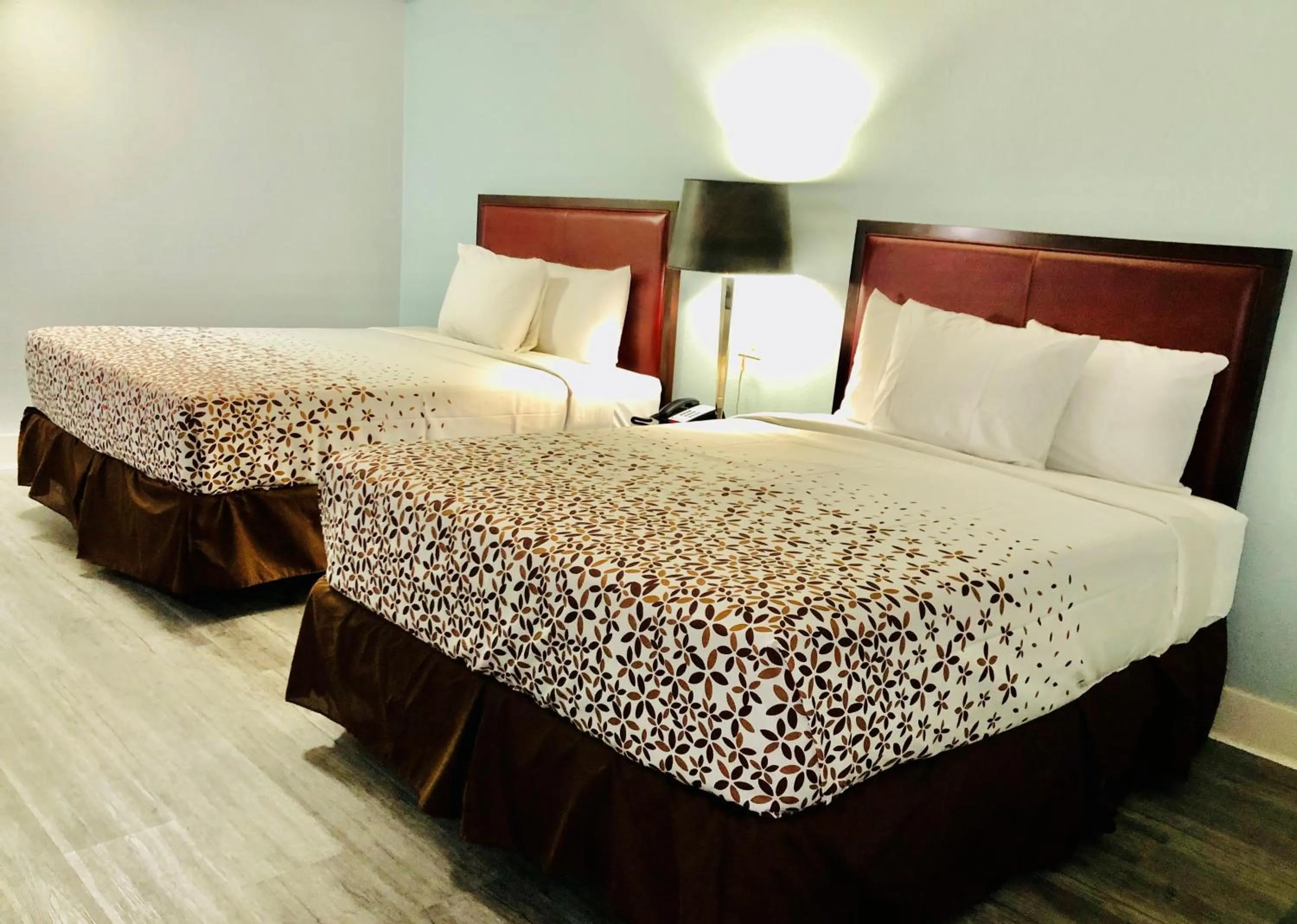 Bed in Montgomery Inn & Suites