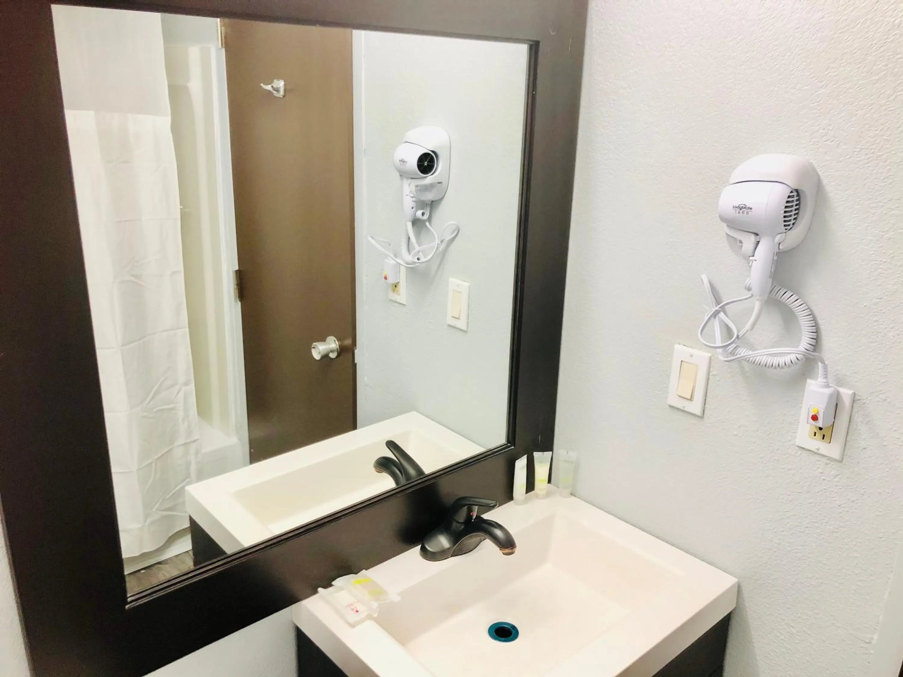 Bathroom in Montgomery Inn & Suites