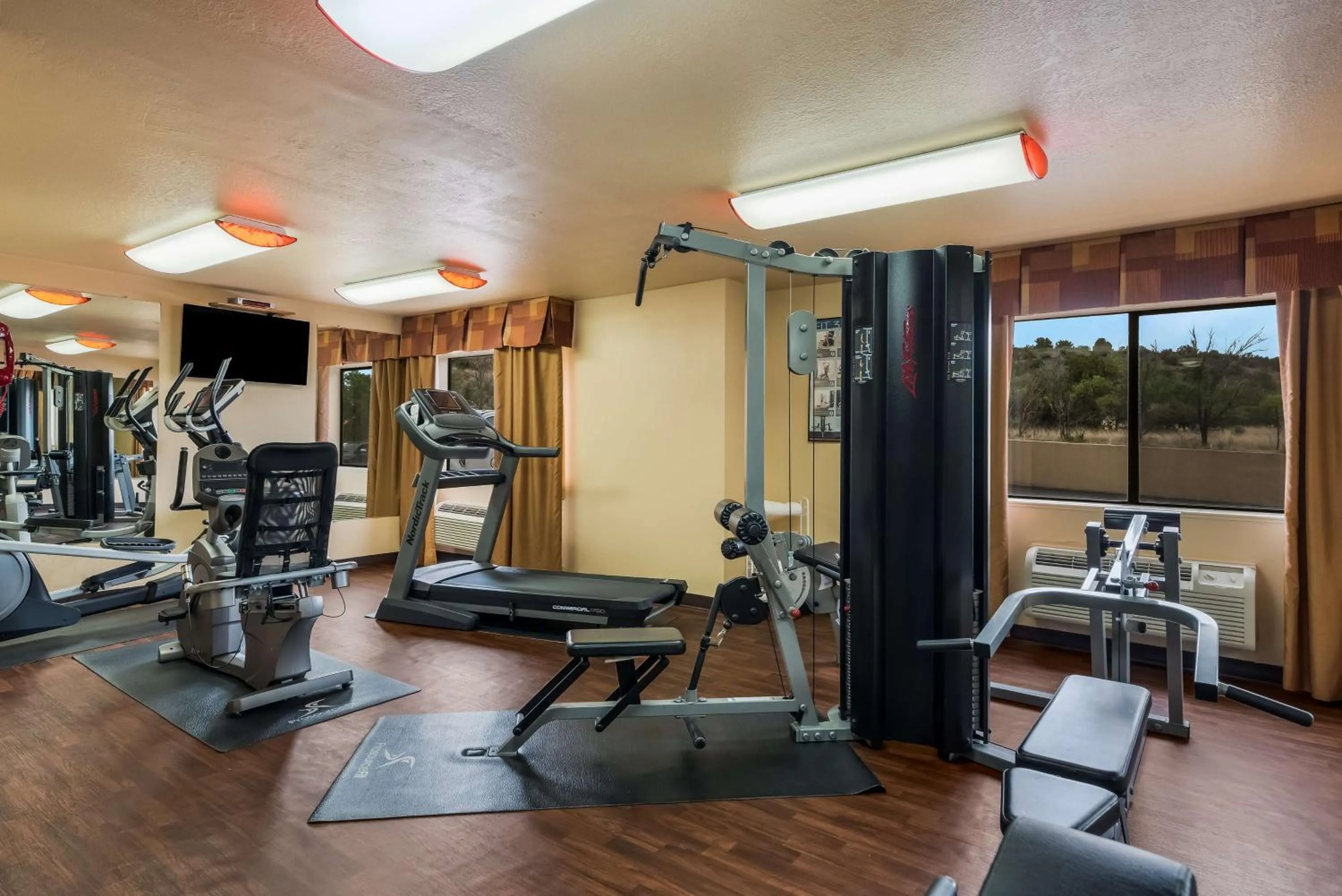 Fitness centre/facilities in SureStay Plus Hotel by Best Western Silver City