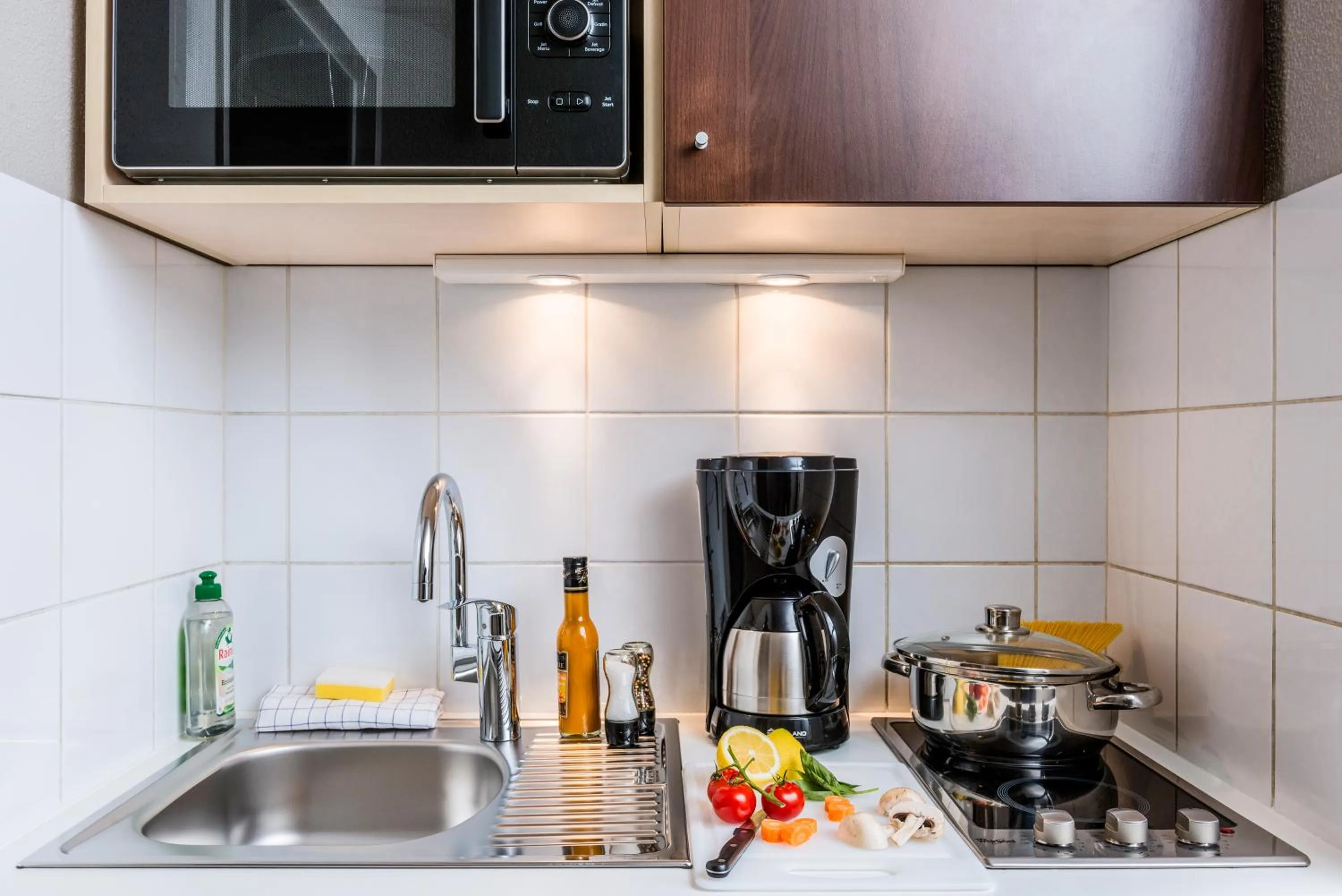 Kitchen or kitchenette in Aparthotel Adagio Access Paris Vanves - Porte de Châtillon